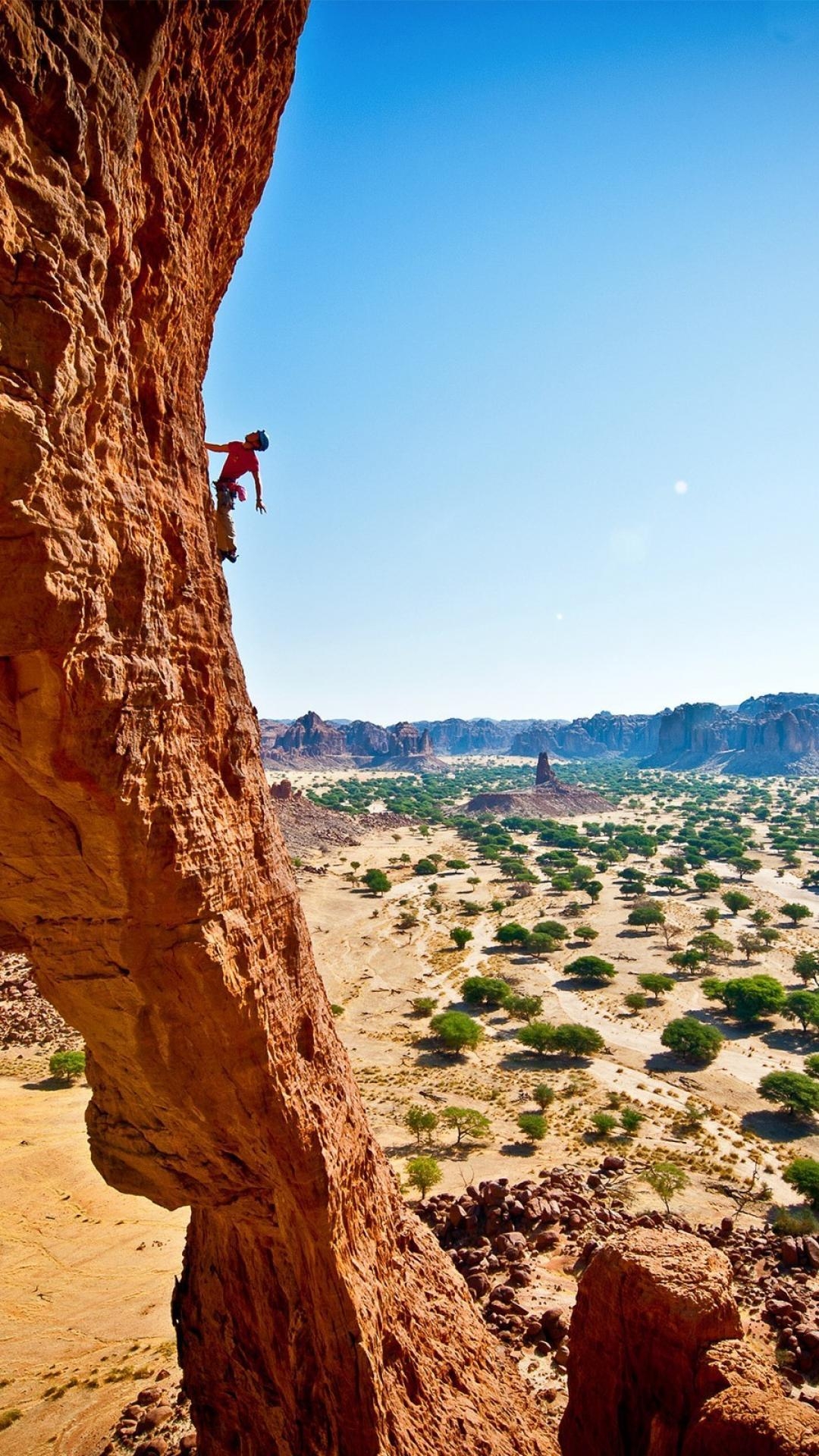 1080x1920 Mountaineers rock climbing shrubs formations chad country, Phone