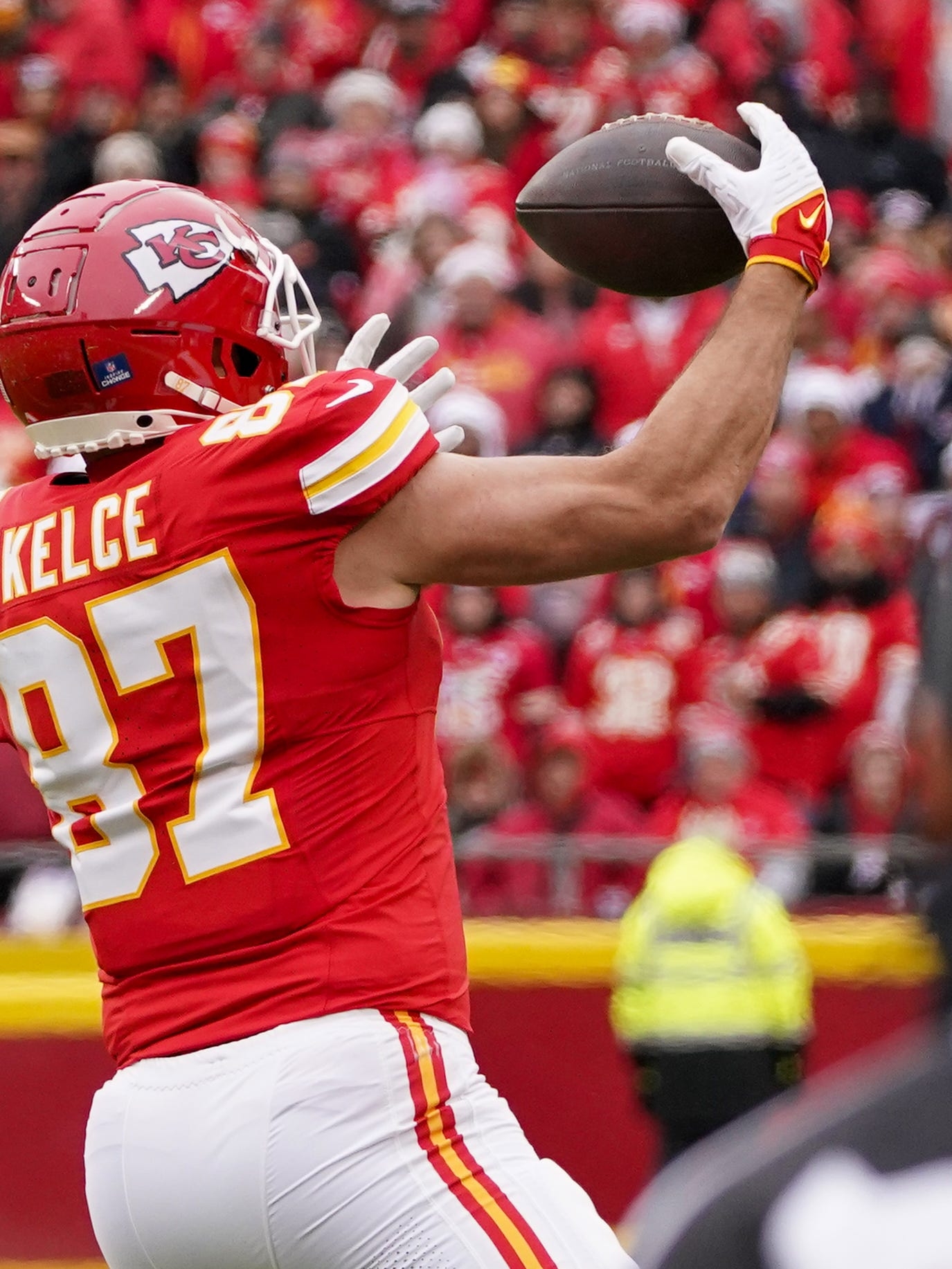 1380x1840 Travis Kelce loses cool, flings helmet, Phone