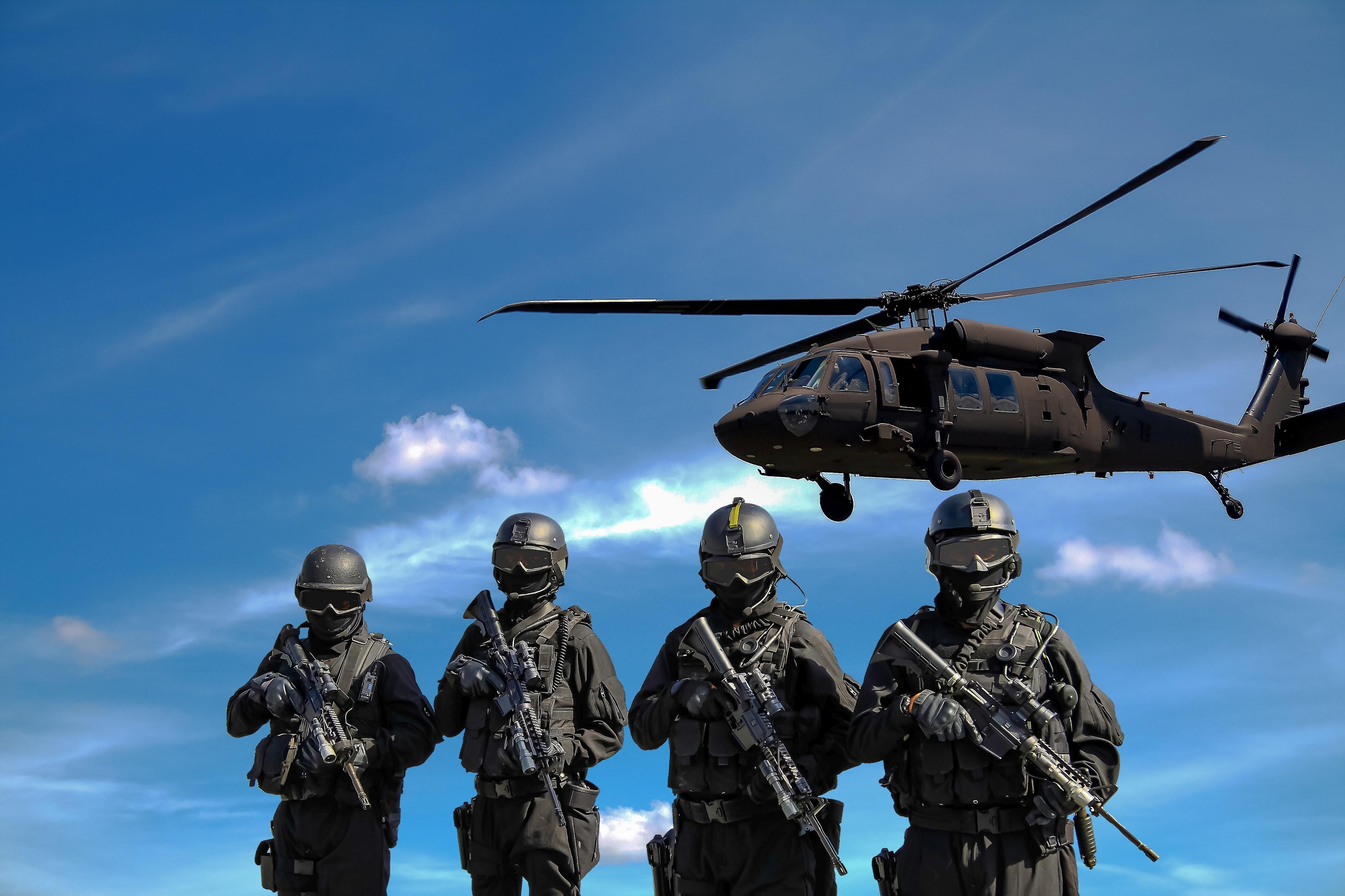 3890x2600 Four Soldiers Carrying Rifles Near Helicopter Under Blue Sky, Desktop