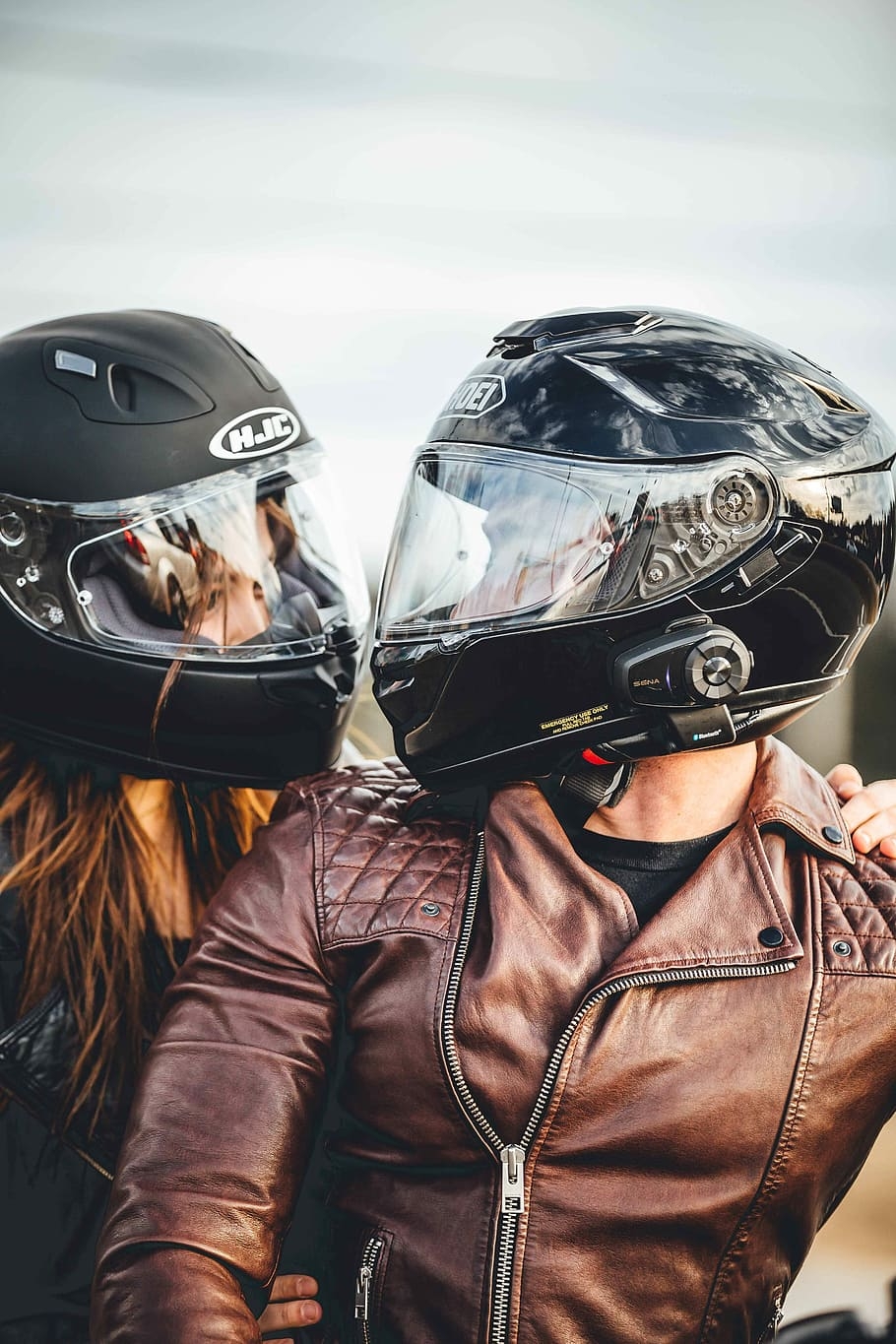 910x1370 HD wallpaper: man and woman riding motorcycle, helmet, biker, couple, leather jacket, Phone