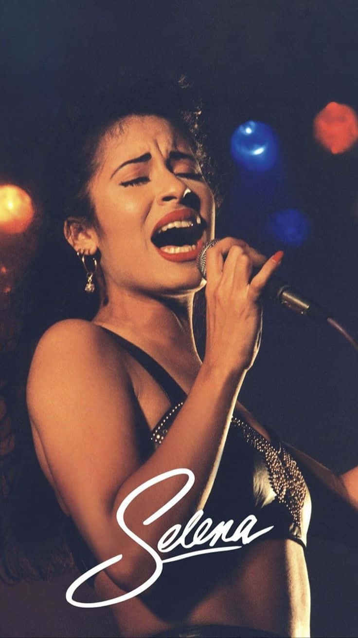 740x1310 Download Celebrate The Queen Of Tejano Anytime With The Selena Quintanilla iPhone Wallpaper, Phone