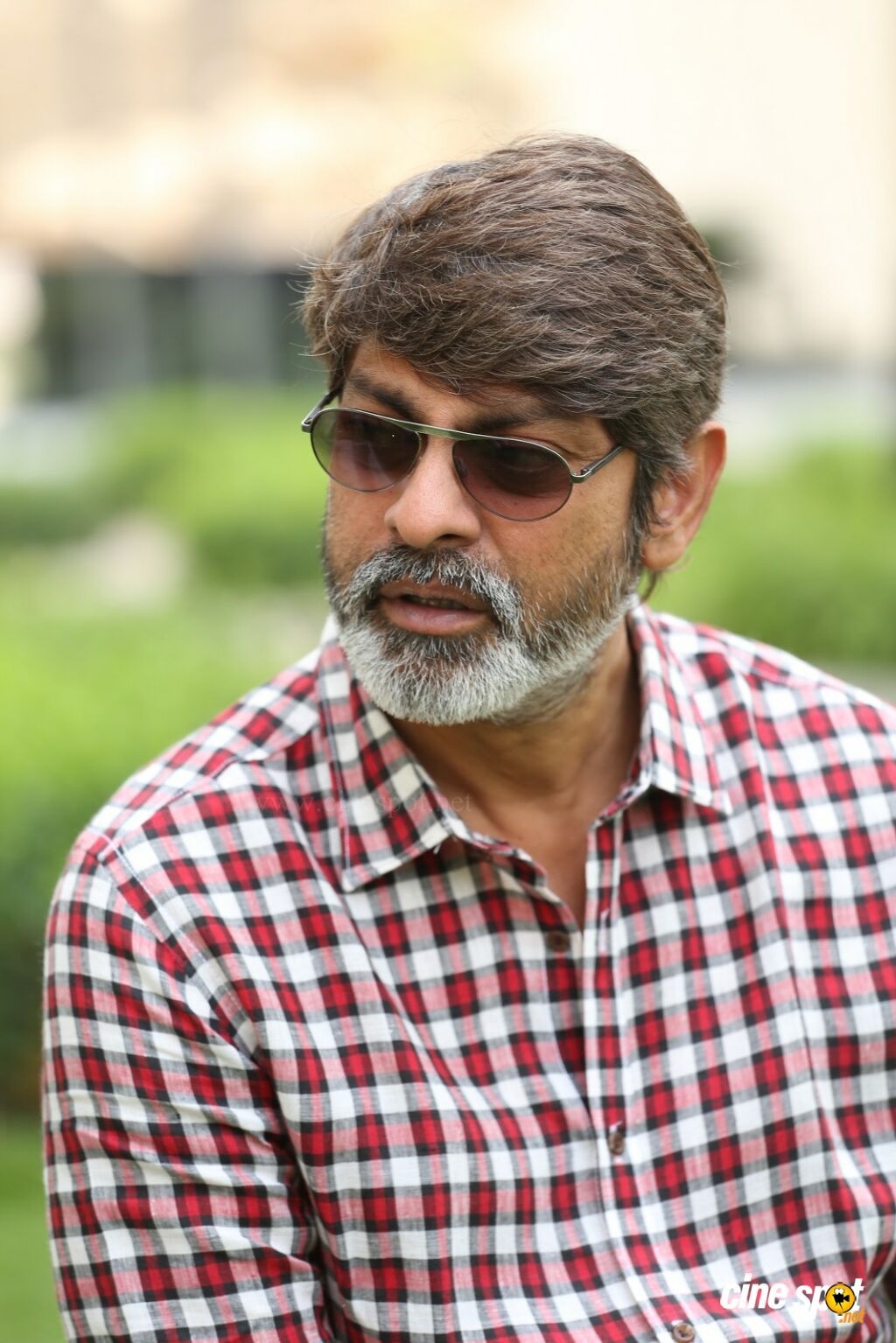 1030x1540 Jagapathi Babu New Photo (15), Phone