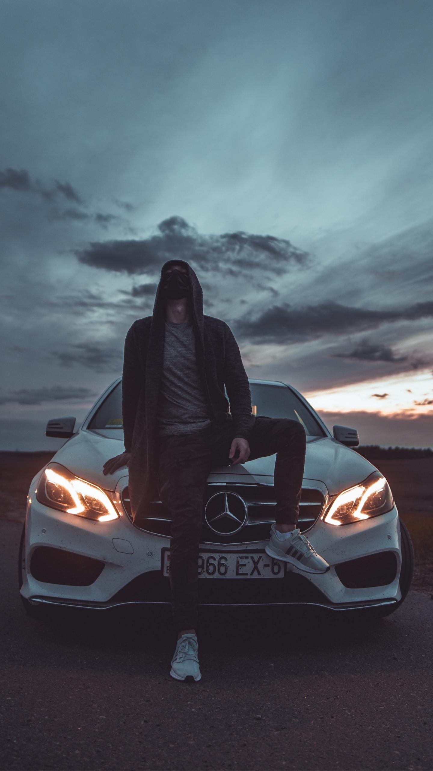 1440x2560 Download wallpaper  mercedes, man, mask, hood, car, Phone