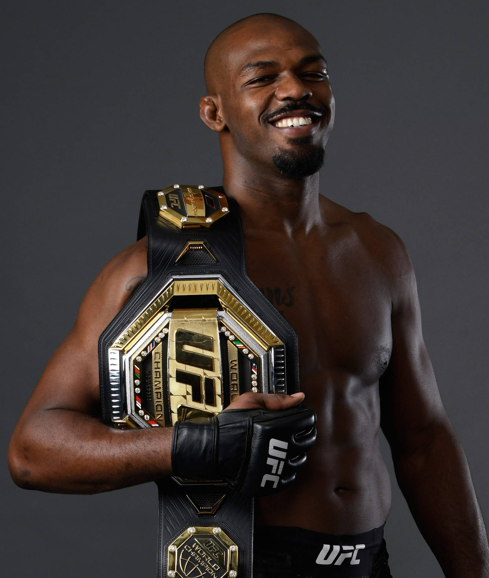 1630x1920 Download Jon Jones Smiling With Champ Belt Wallpaper, Phone