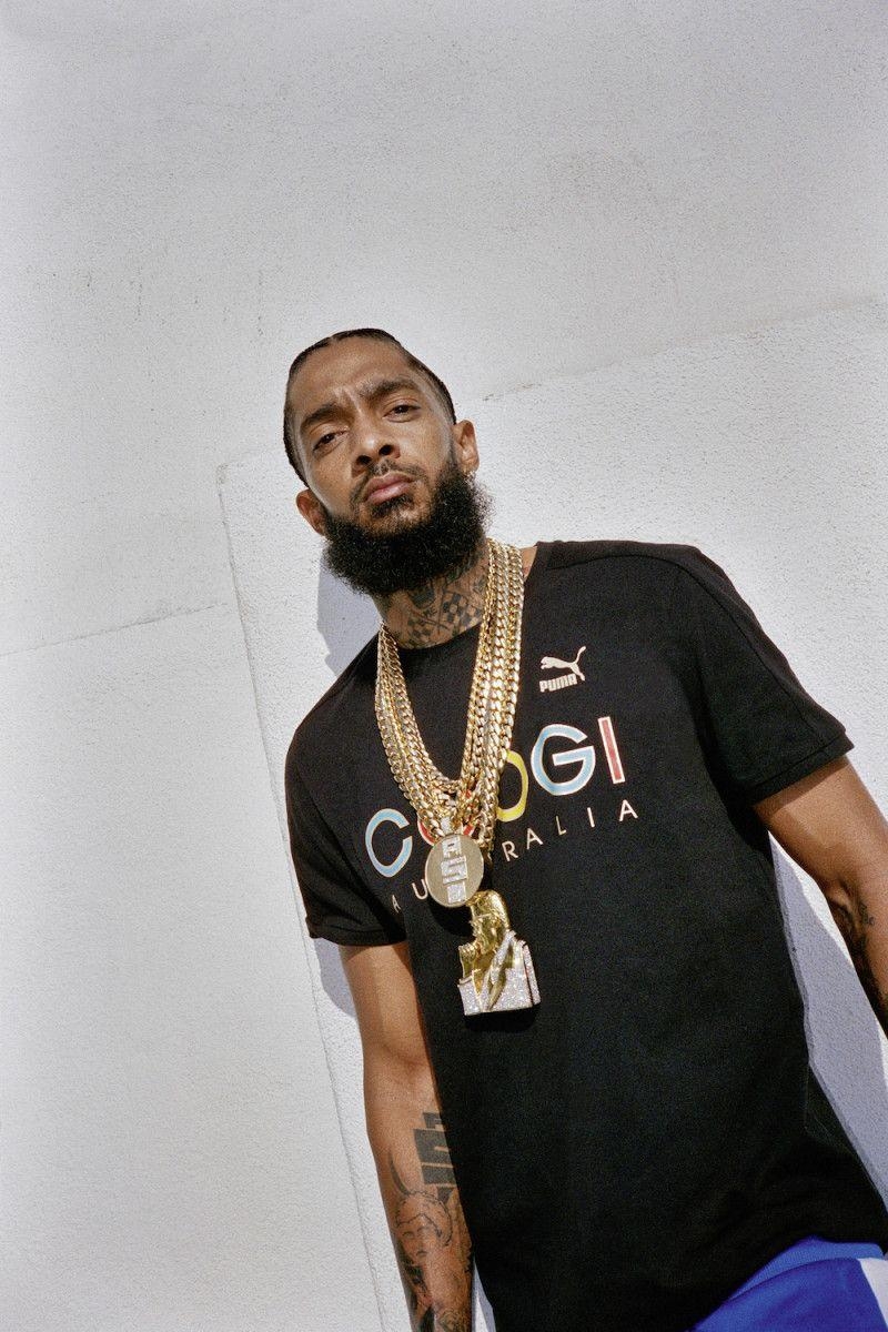 800x1200 PUMA & COOGI Debut Colorful Authentic Tee on Nipsey Hussle. Eye, Phone