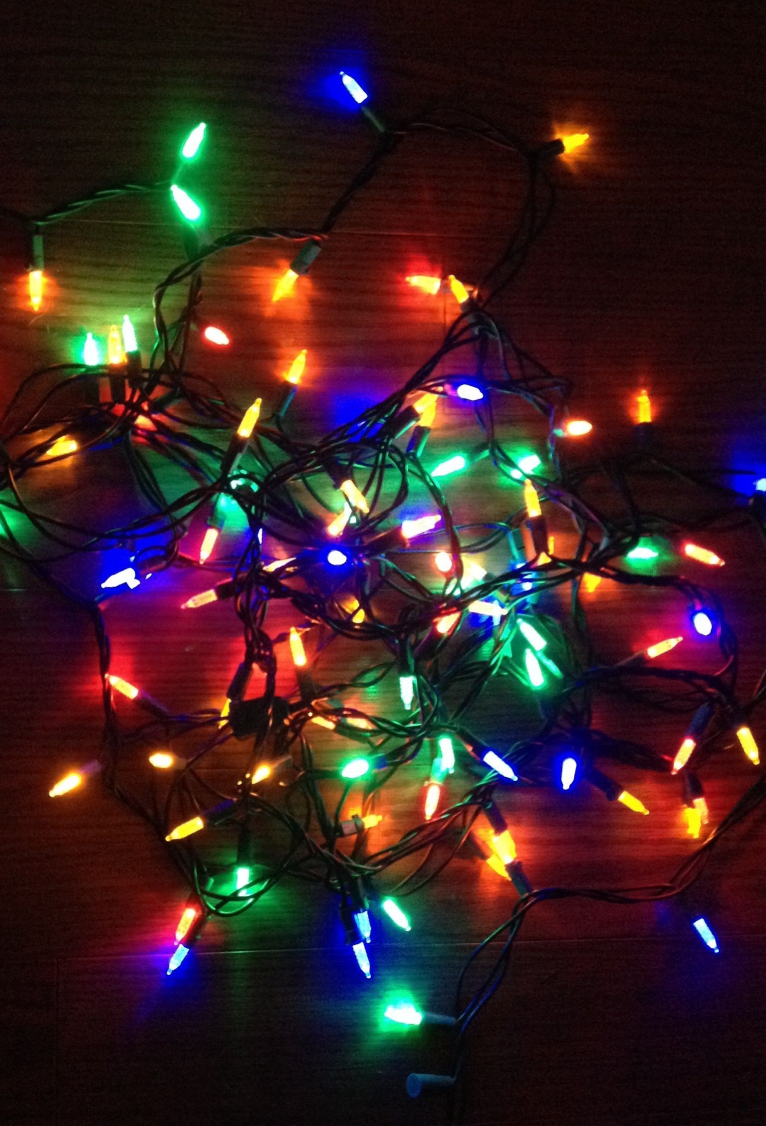 1540x2260 Packing up the Christmas lights. By KimStewart. Christmas wallpaper, Christmas lights, Neon wallpaper, Phone