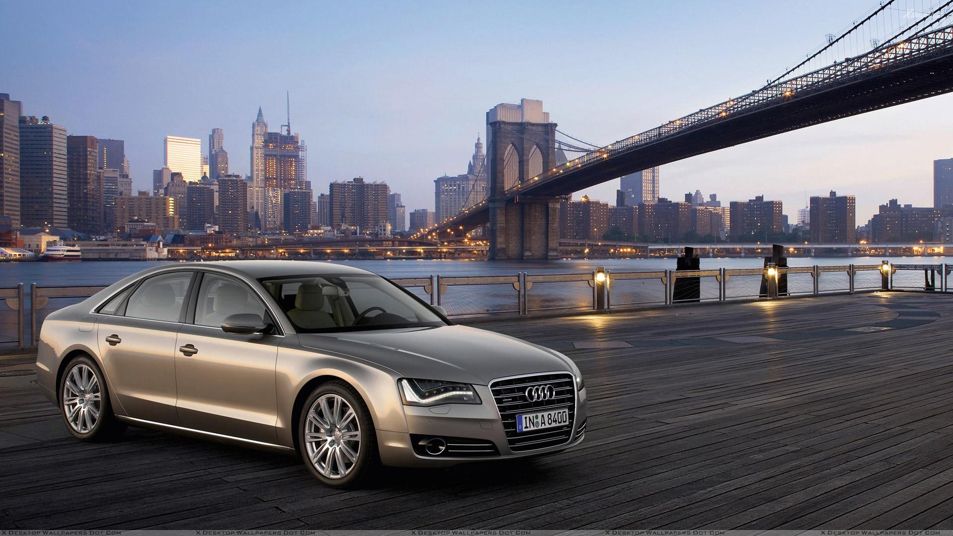 1920x1080 Audi A8 Side Front Pose In Golden Wallpaper, Desktop