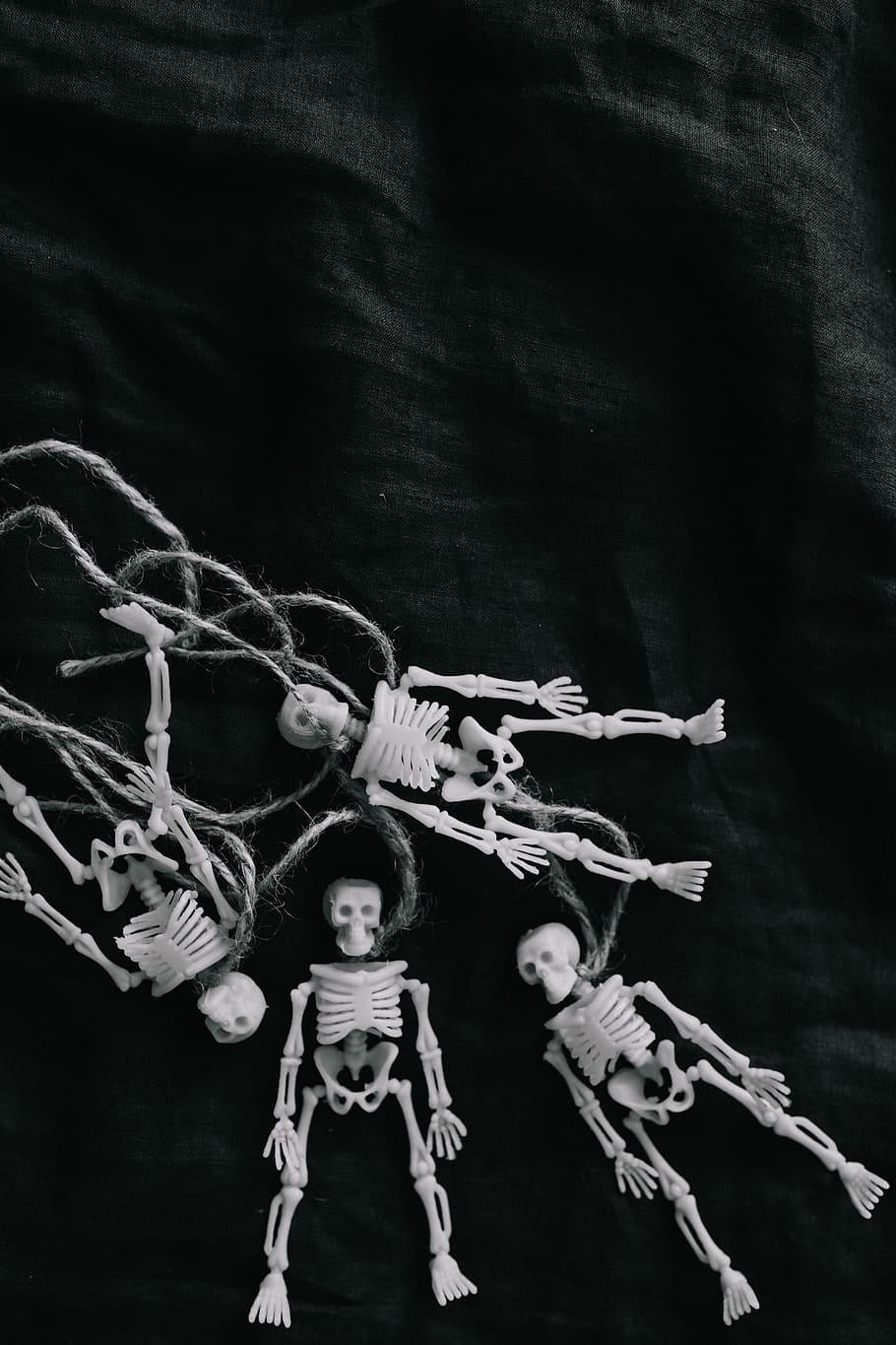 910x1370 HD wallpaper: Halloween skeleton miniatures, toy, skull, spooky, october, Phone