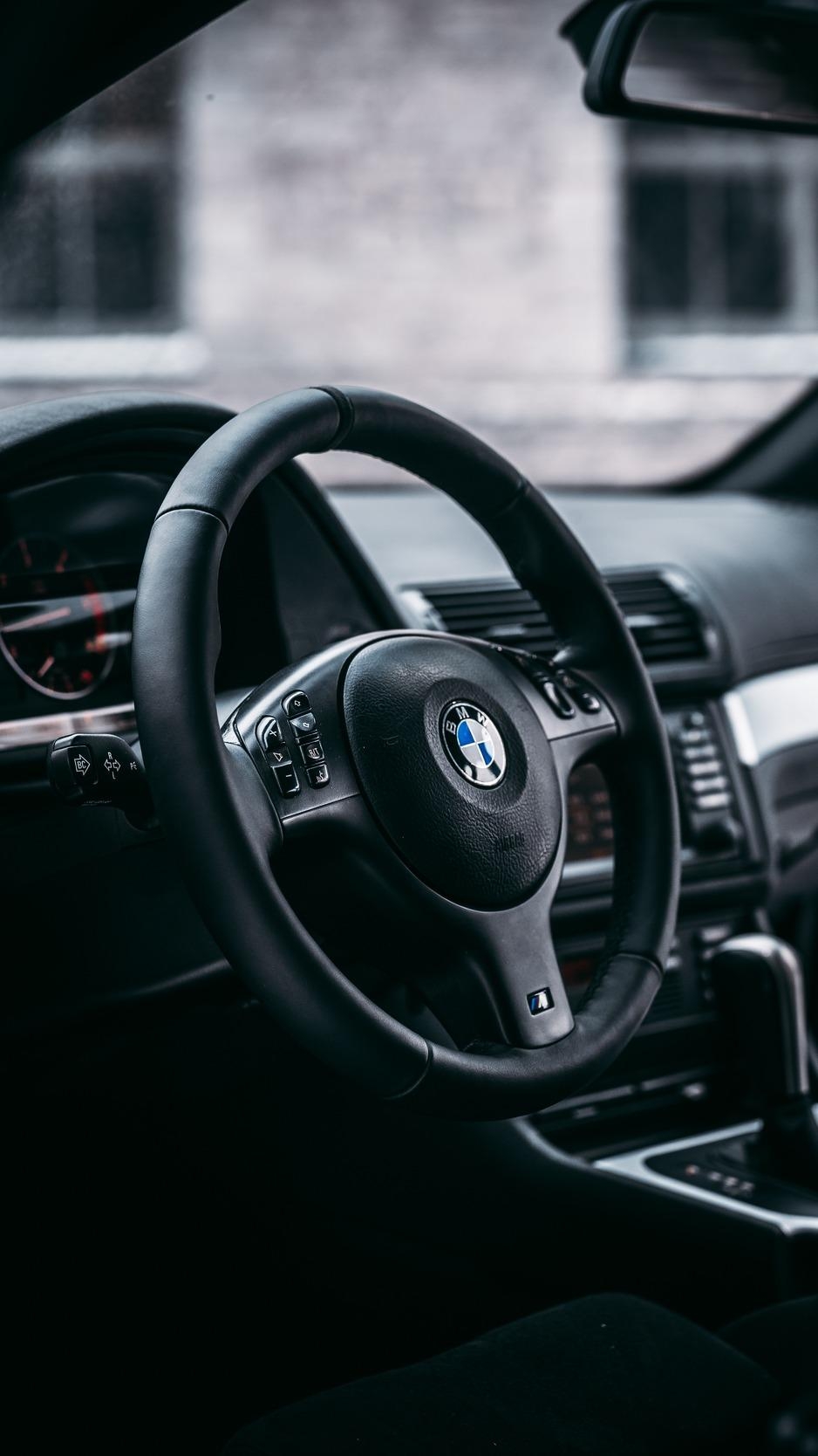 940x1670 Download wallpaper  bmw, steering wheel, car, car, Phone