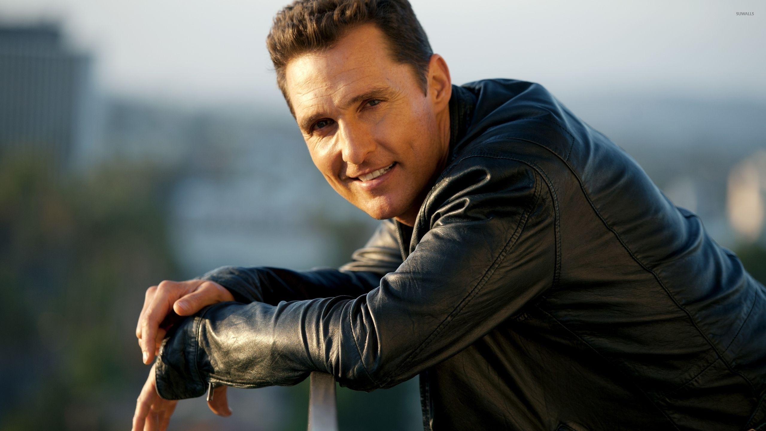 2560x1440 Matthew McConaughey in a black leather jacket wallpaper, Desktop