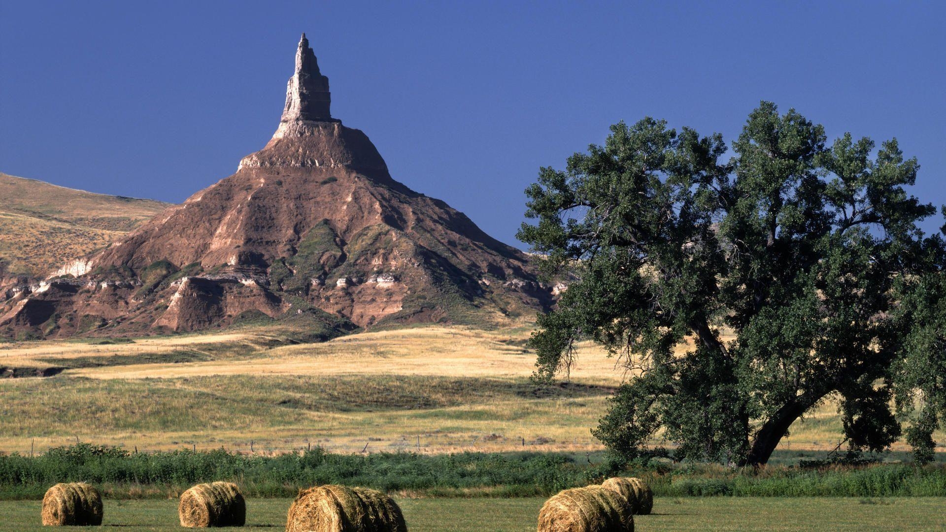 1920x1080 Hay Rolls Below Chimney Rock, Desktop