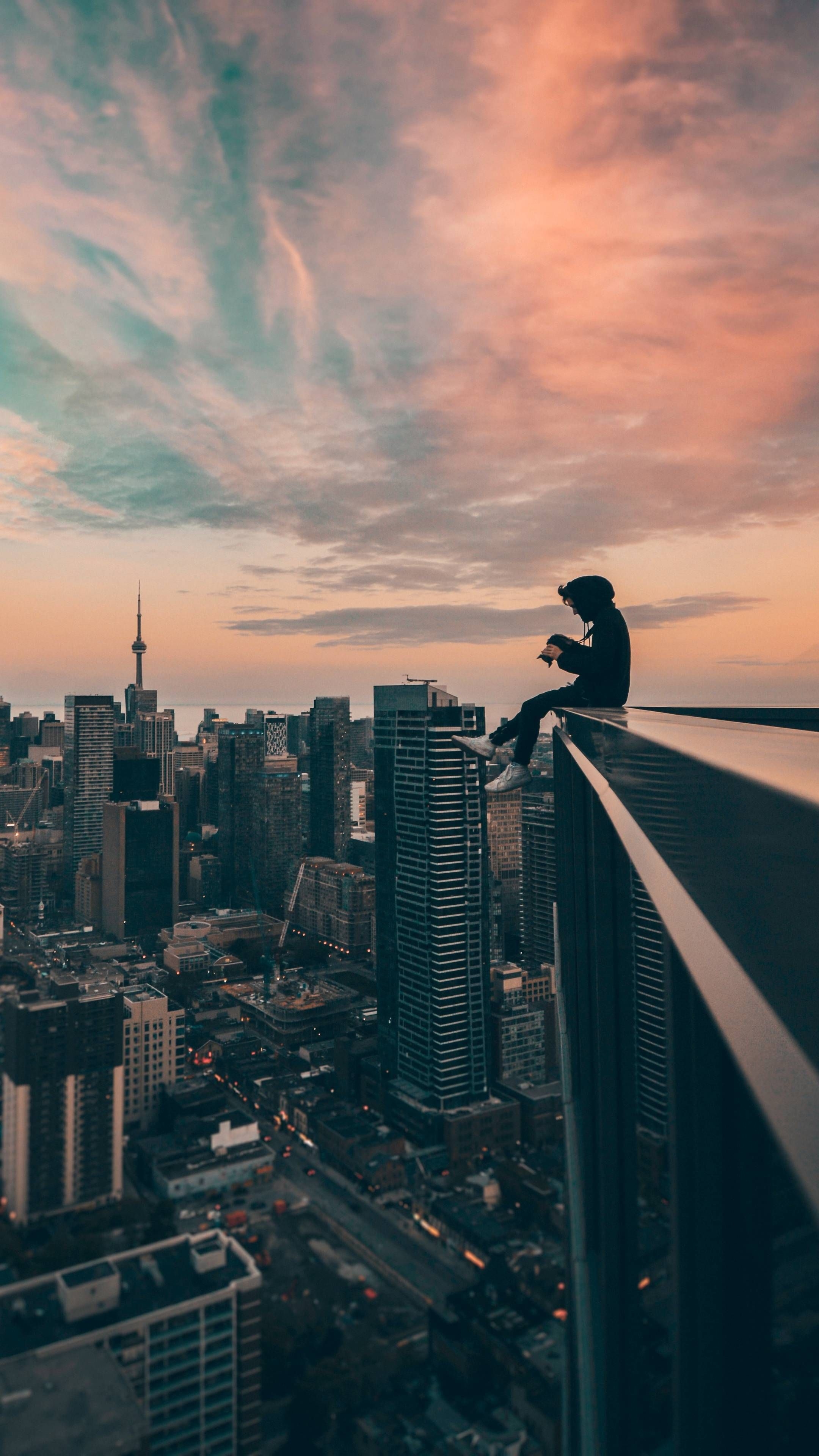 2160x3840 A Man Sitting on Top of a Building. Phone wallpaper for men, Anime scenery wallpaper, Anime scenery, Phone