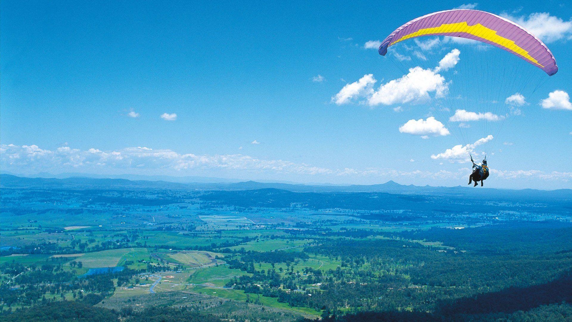 1920x1080 paragliding paragliding man flight mountain sky clouds land height, Desktop