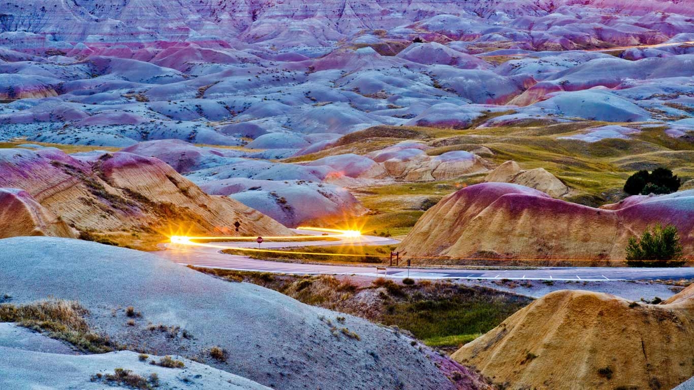 1370x770 Headlights streaking through Badlands National Park, South Dakota, Desktop