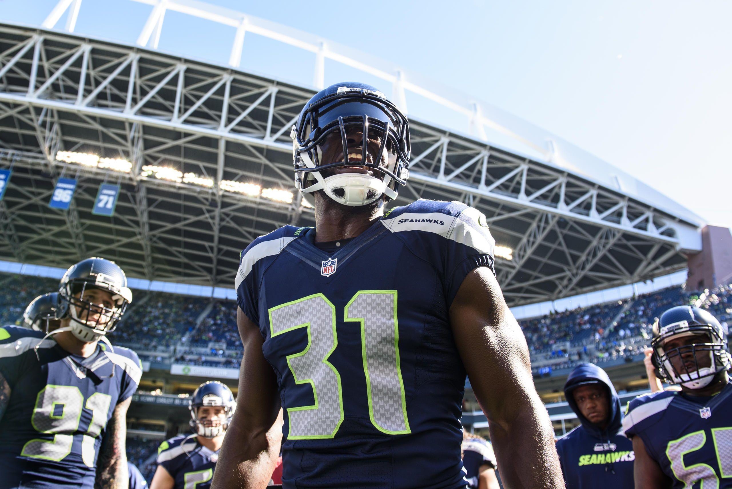 2560x1710 The Enforcer Kam Chancellor celebrates another birthday. Seattle, Desktop