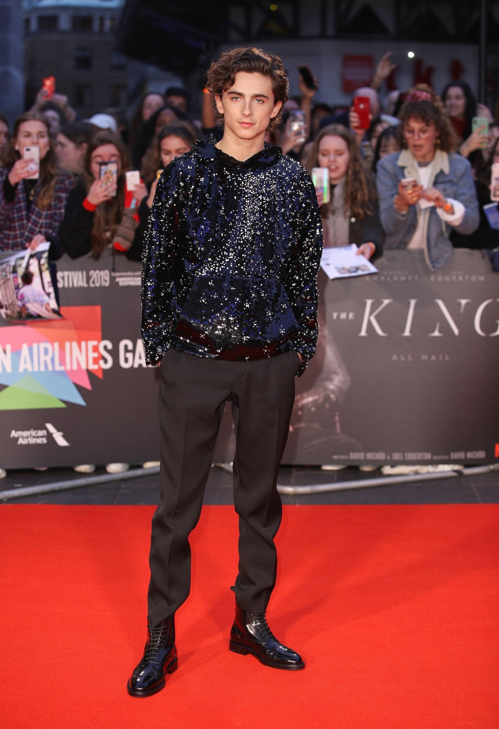 1600x2340 Timothée Chalamet Shakes up the Red Carpet with a High, Phone