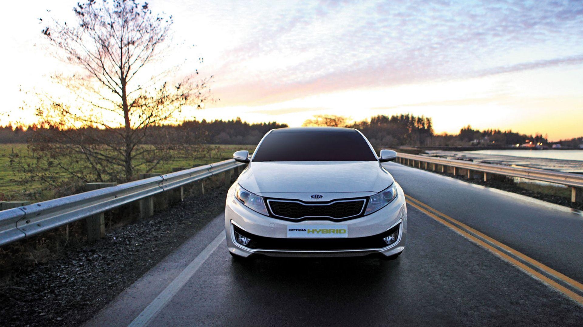 1920x1080 Front Pose of Kia Optima Hybrid On Highway Wallpaper, Desktop