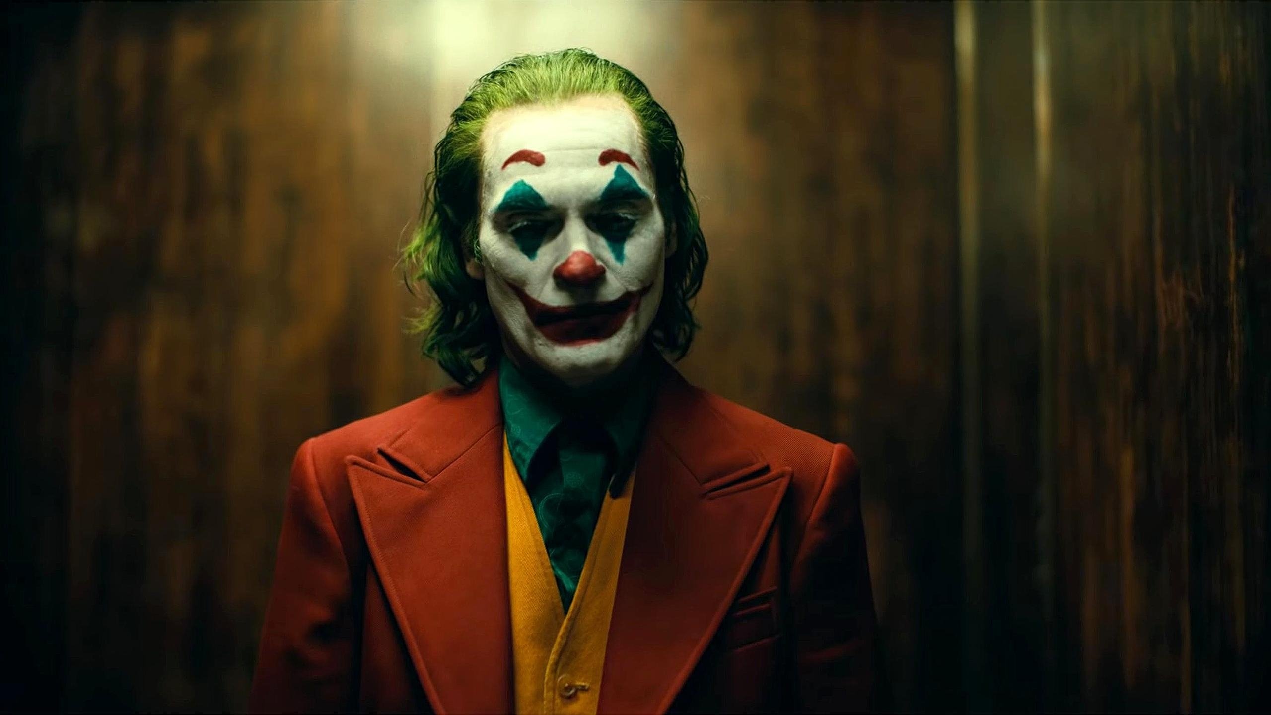 2560x1440 Joaquin Phoenix As Joker Wallpaper, HD Movies 4K Wallpaper, Desktop