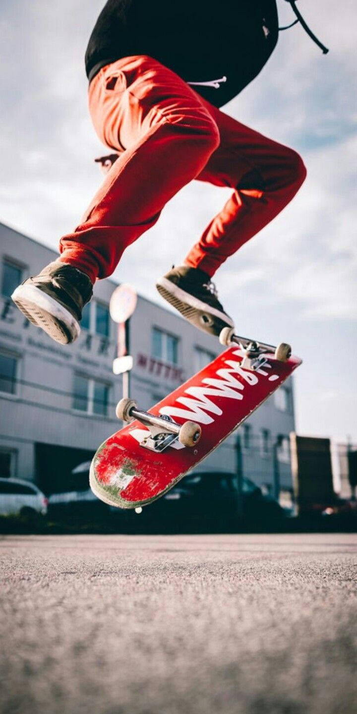 720x1440 Download Skater With Red Skateboard iPhone Wallpaper, Phone