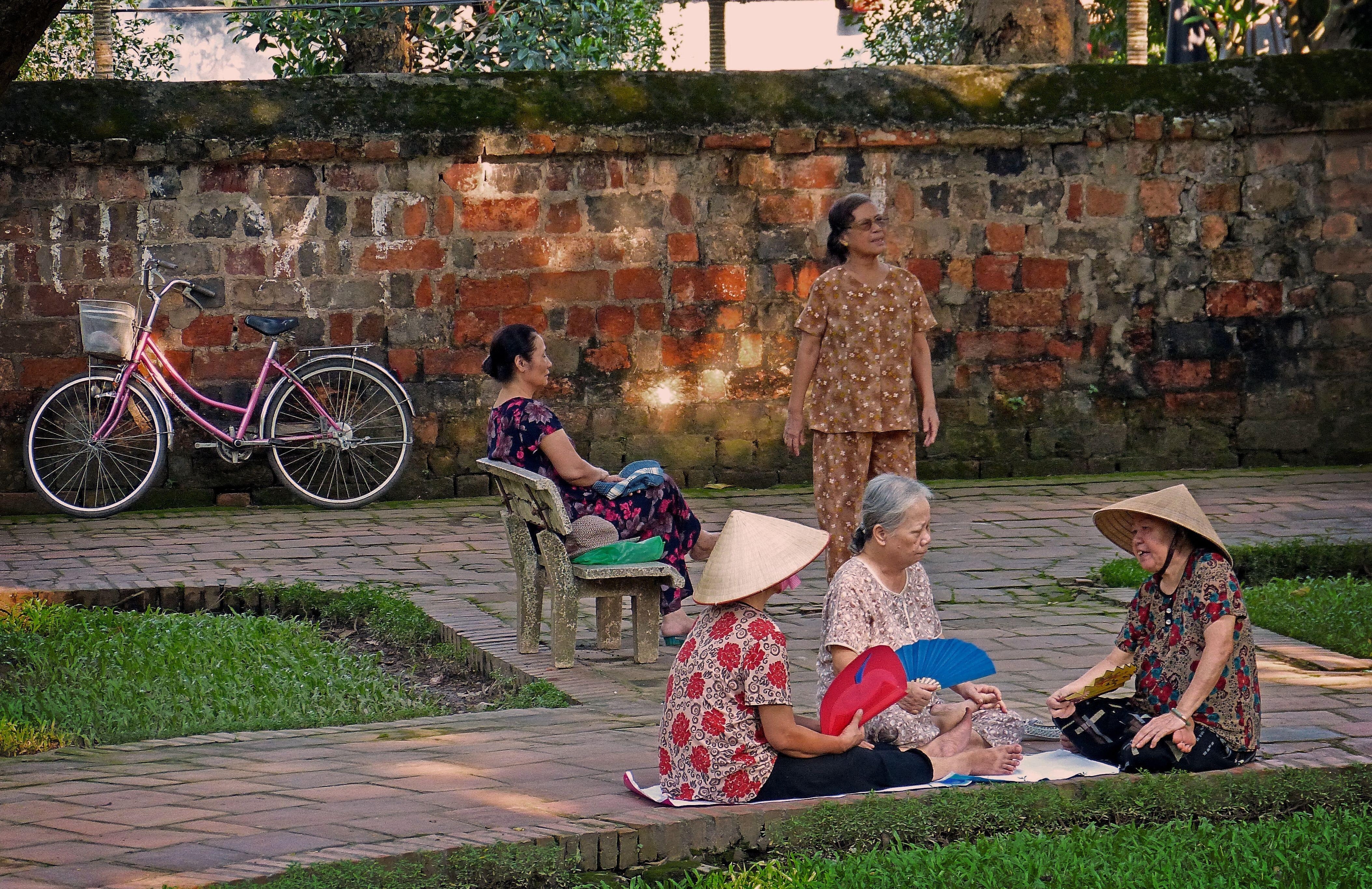 4220x2740 Wallpaper, people, women, street, bicycle, sitting, wall, life, Desktop