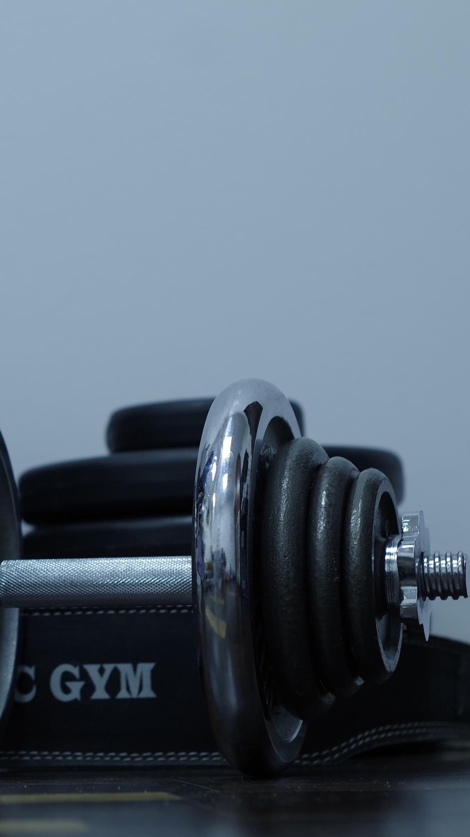 940x1670 Download wallpaper  dumbbells, gym, weight, disks iphone 8, Phone