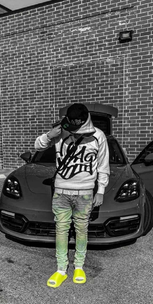 650x1290 Download Rapper Yeat With Fancy Car Wallpaper, Phone