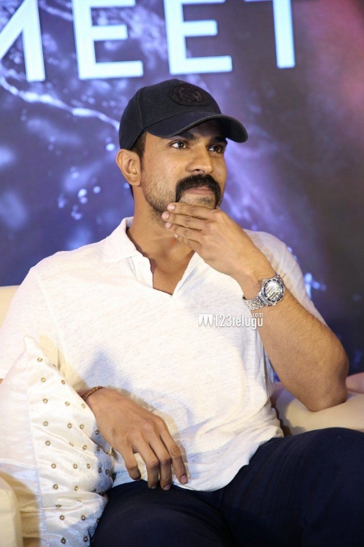 750x1130 NTR and Ram Charan at RRR movie press meet, Phone