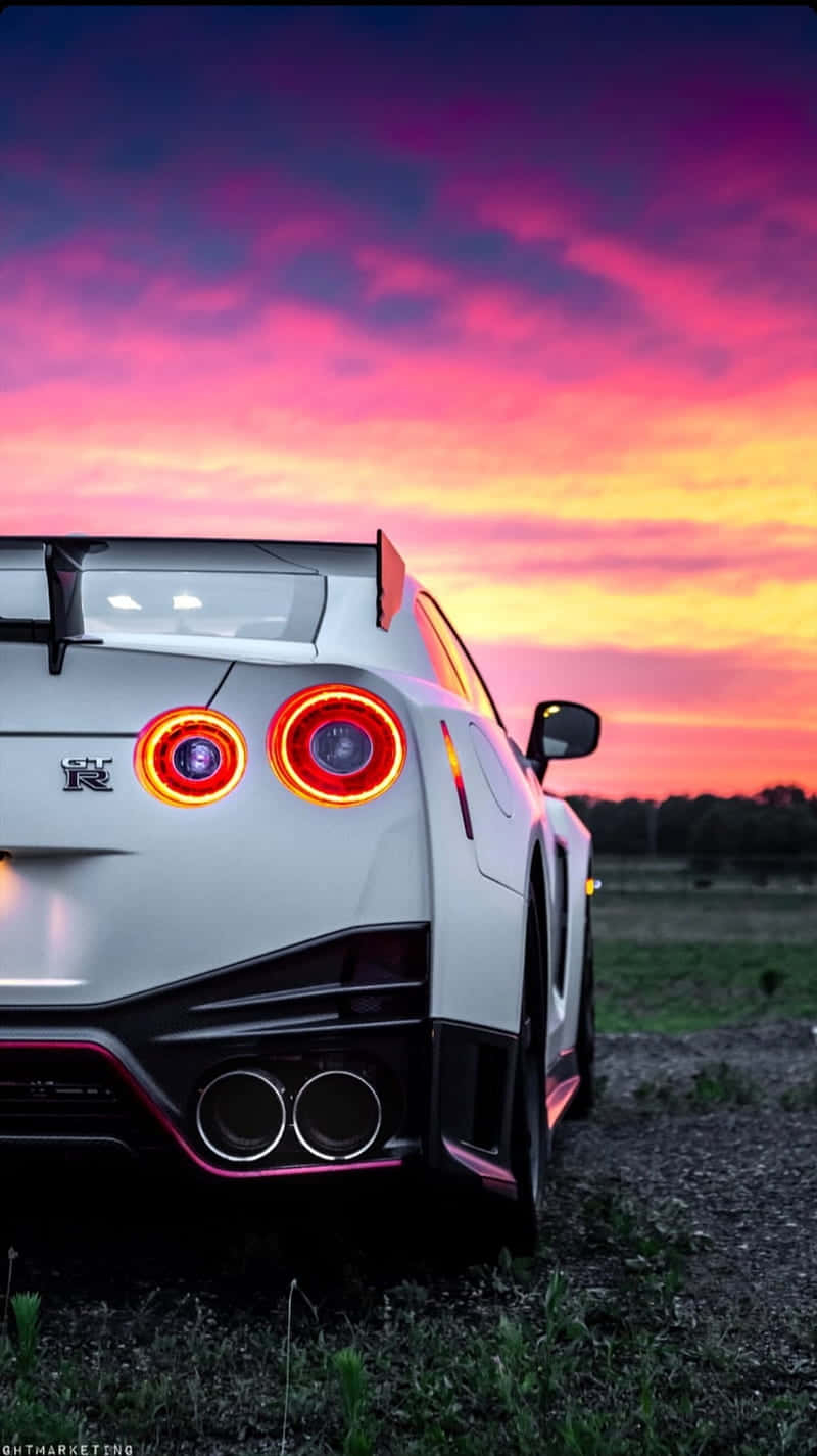 800x1430 Download White Nissan R35 Gtr Orange Violet Sky Wallpaper, Phone