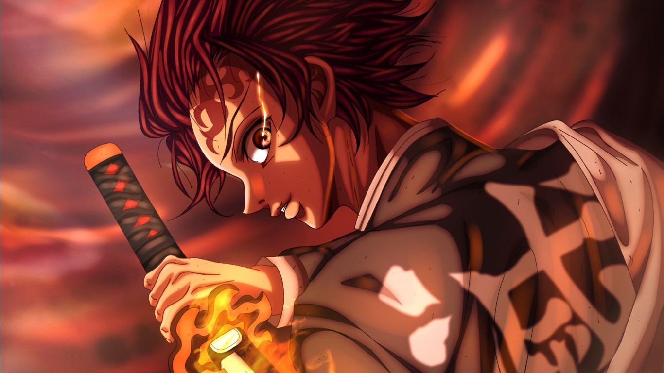 1370x770 Demon Slayer Tanjiro Kamado Having Fire Sword With Blur Background HD Anime Wallpaper, Desktop