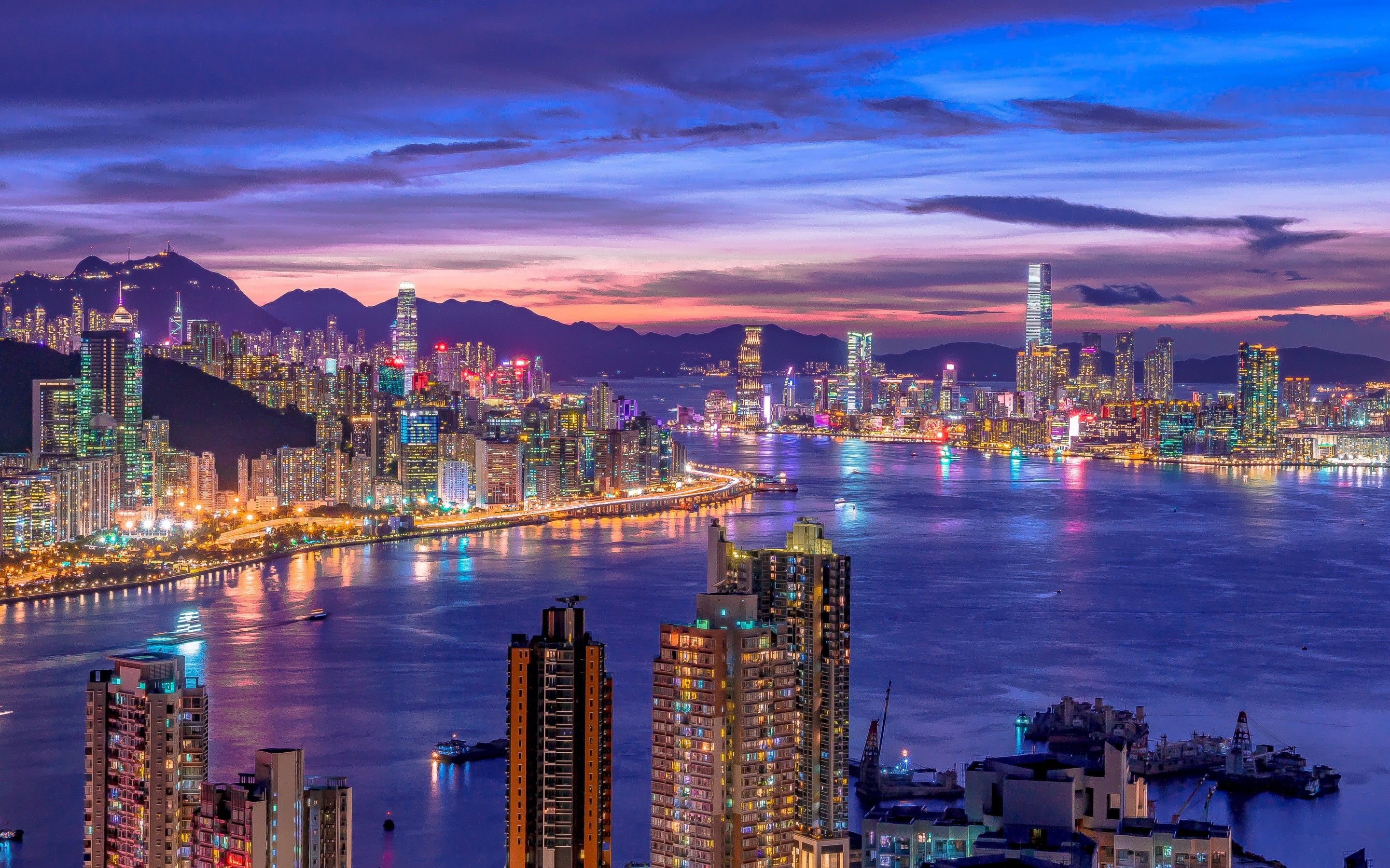 2880x1800 City Skyline 4K Wallpaper, Night life, Cityscape, Hong Kong, Skyscrapers, Purple sky, River, Sunset, World, Desktop