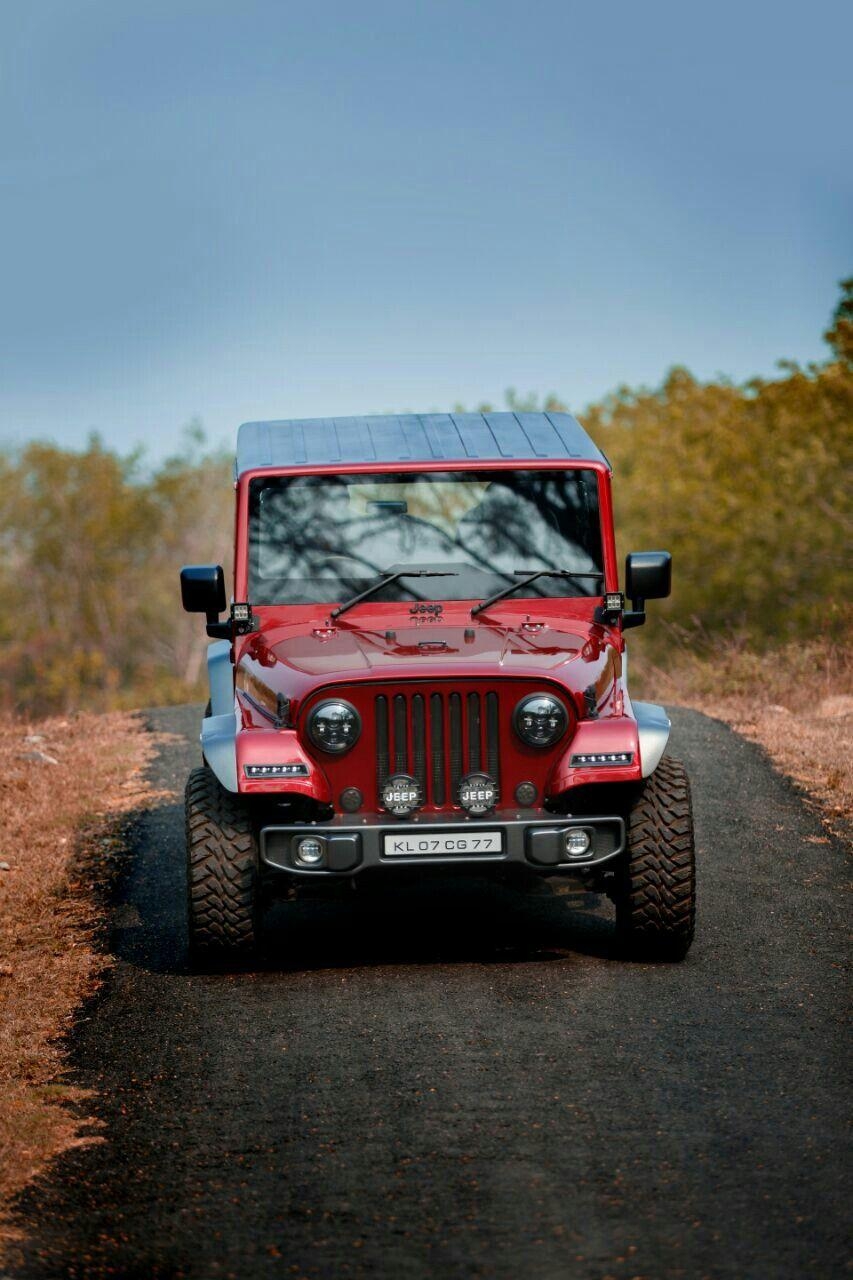 860x1280 Mahindra Thar CRDi 4x4 modified into Jeep. Studio background, Phone