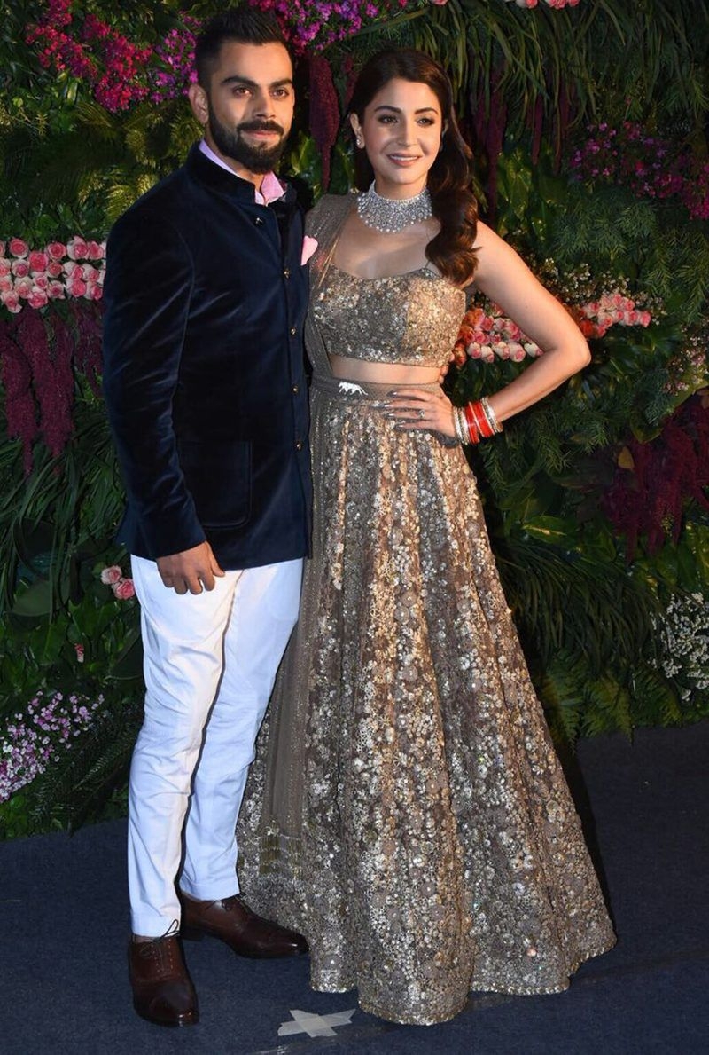 800x1190 Candid Photo of Virat Kohli & Anushka Sharma From Reception, Phone