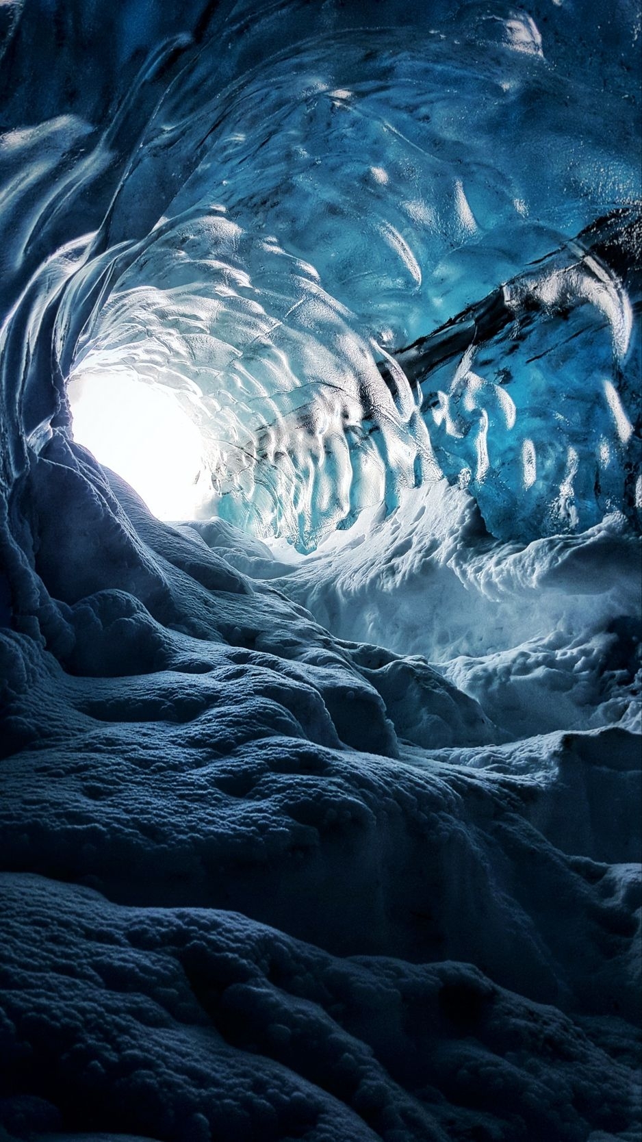 940x1670 Download wallpaper  cave, ice, snow, ice cave, iceland, Phone