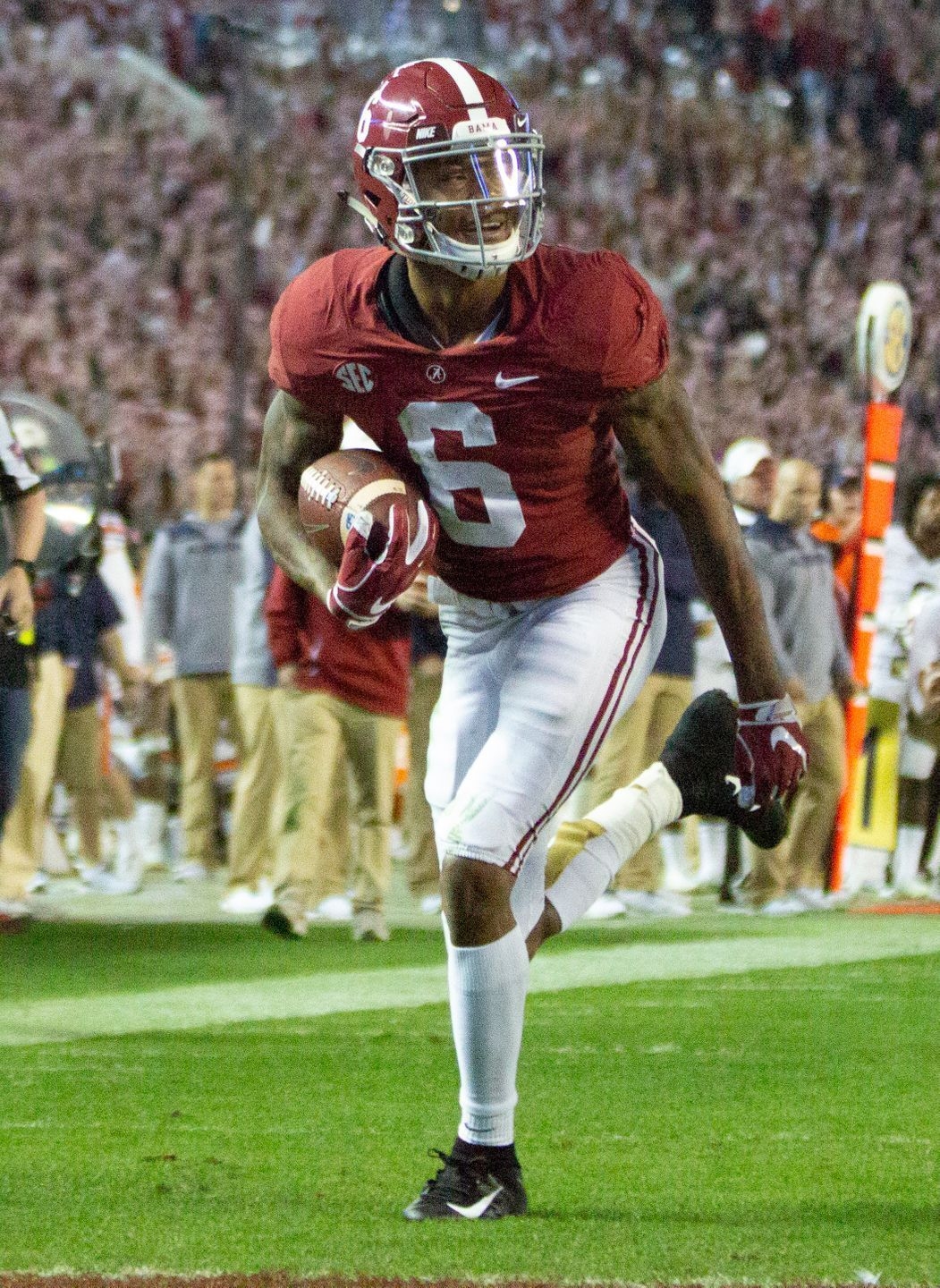 1060x1440 Alabama's DeVonta Smith smiles as he crosses the end zone for a touchdown in the third quarter. Crimson tide football, Alabama football, Alabama, Phone