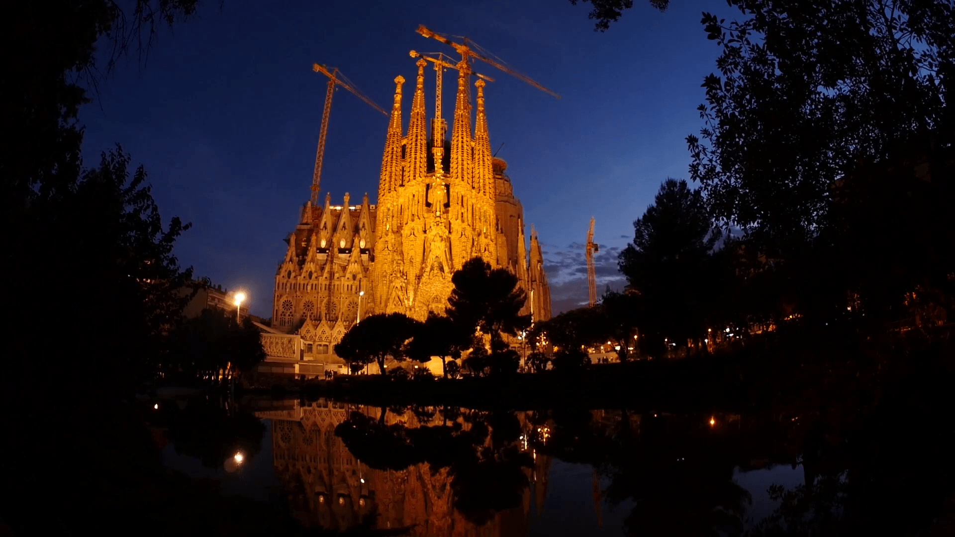 1920x1080 La Sagrada Familia Cathedral Barcelona at Night, Reflection in Water, Desktop