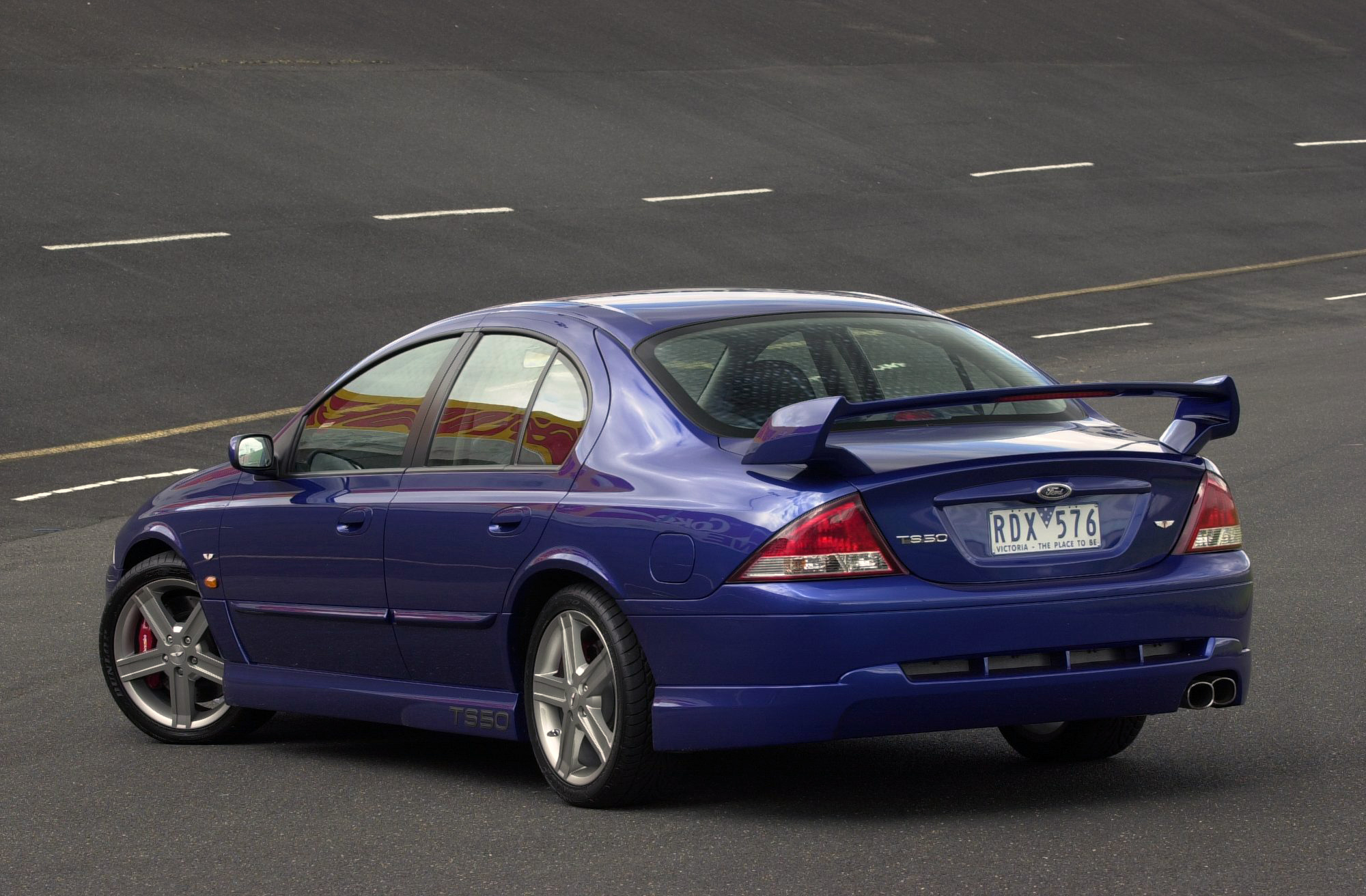 2000x1320 Wallpaper, sports sedan, Ford Falcon, Ford FTE T50 Series, rear view, race tracks, rear wing, spoilers, old car, blue, curvy, banked turn, racetrack, Desktop