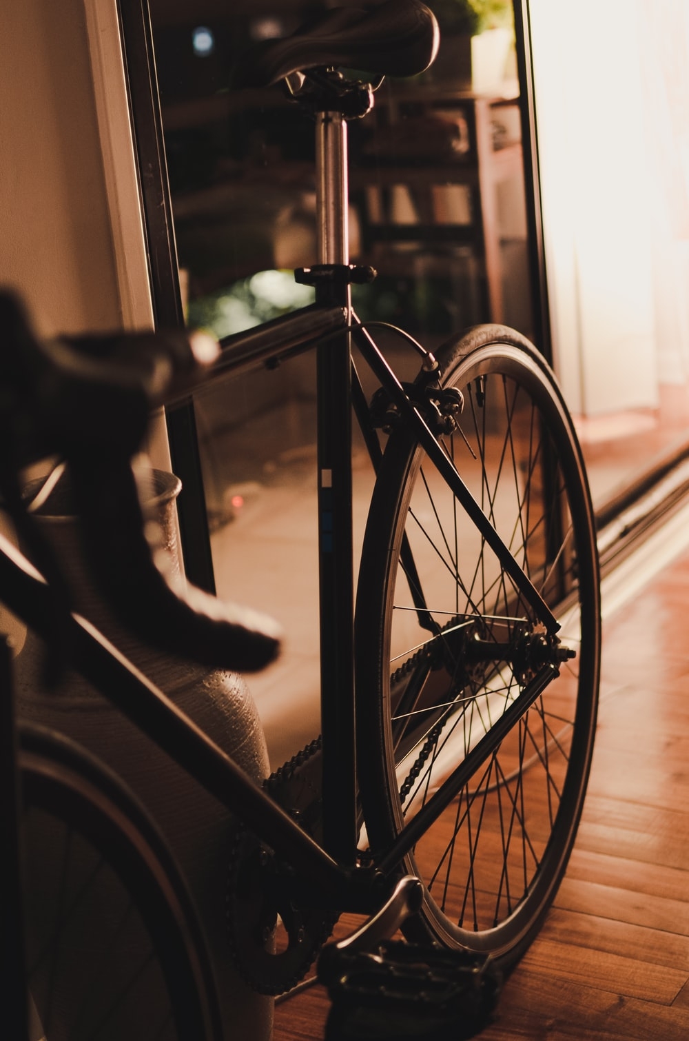 1000x1510 grayscale photo of bicycle near window photo, Phone