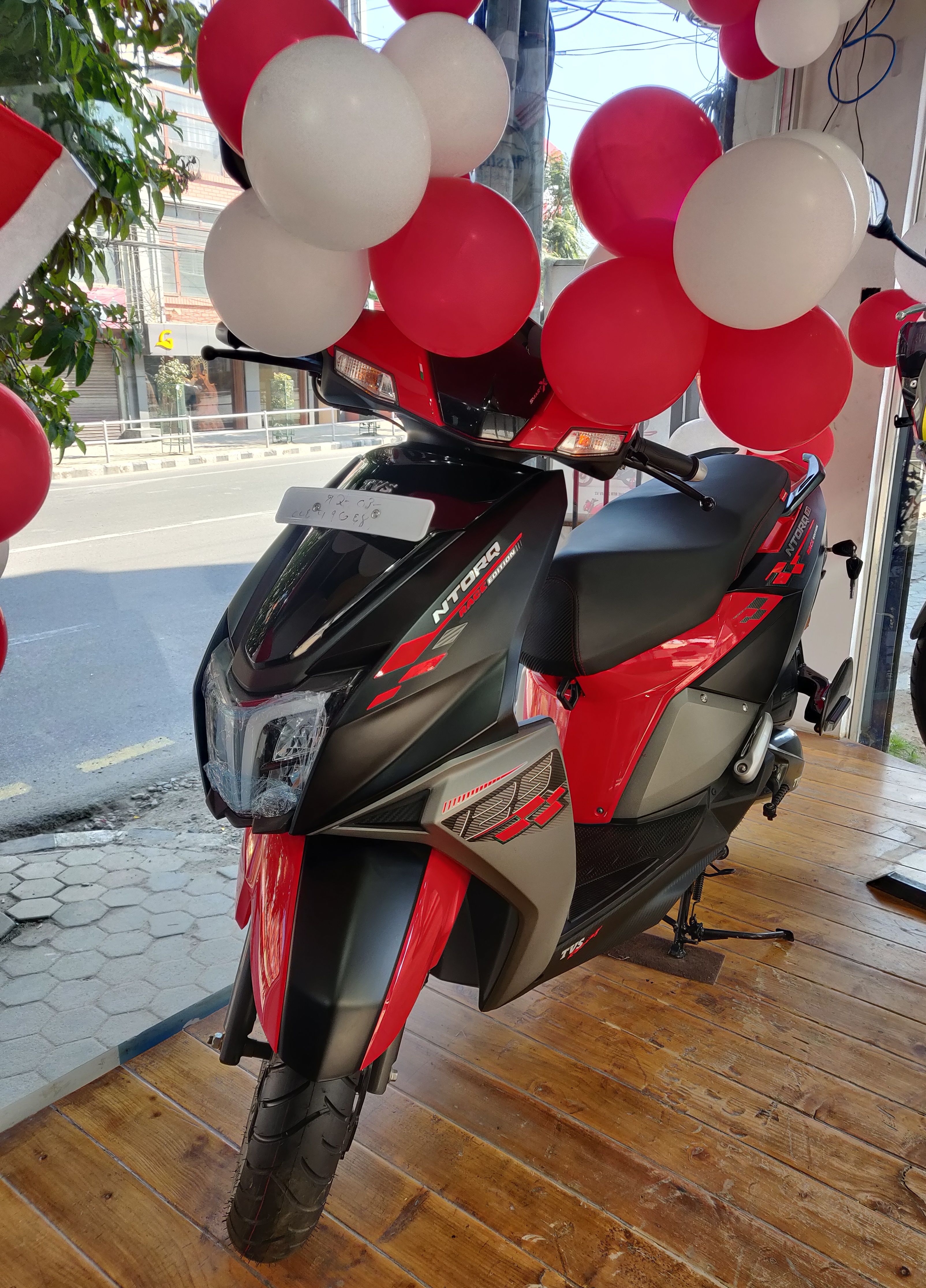 3210x4470 TVS launches new TVS Ntorq 125 Race Edition in Nepal, Phone