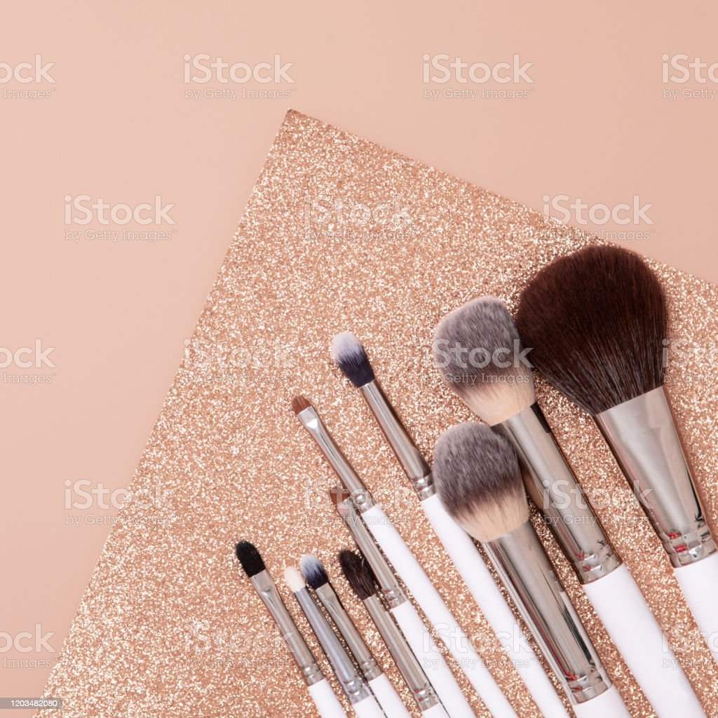 1030x1030 Makeup Brush In Flat Lay Style On Soft Glitter Beige And Gold Background Top View Image Now, Phone