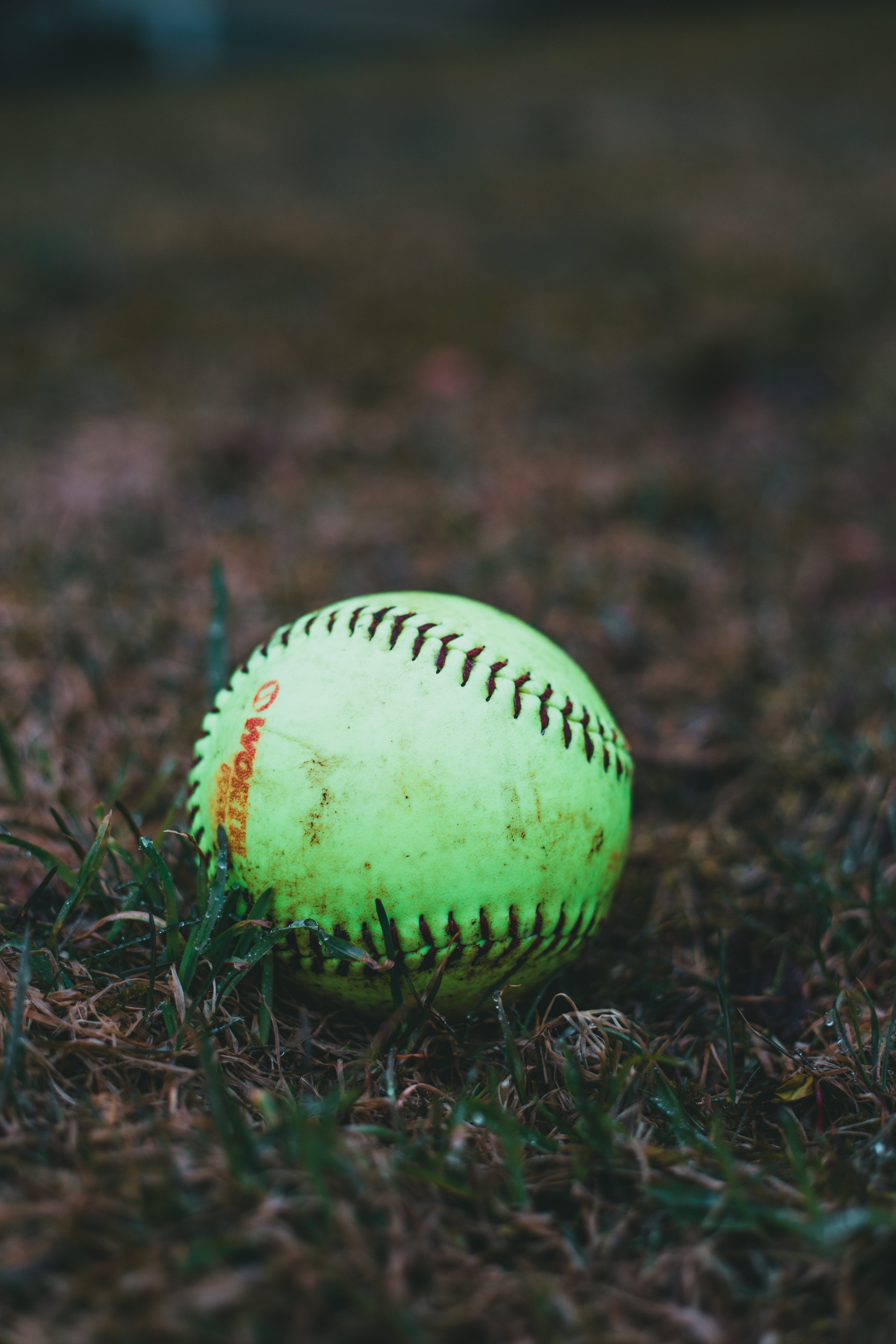 3650x5480 Close Up Shot Of A Green Baseball On A, Phone