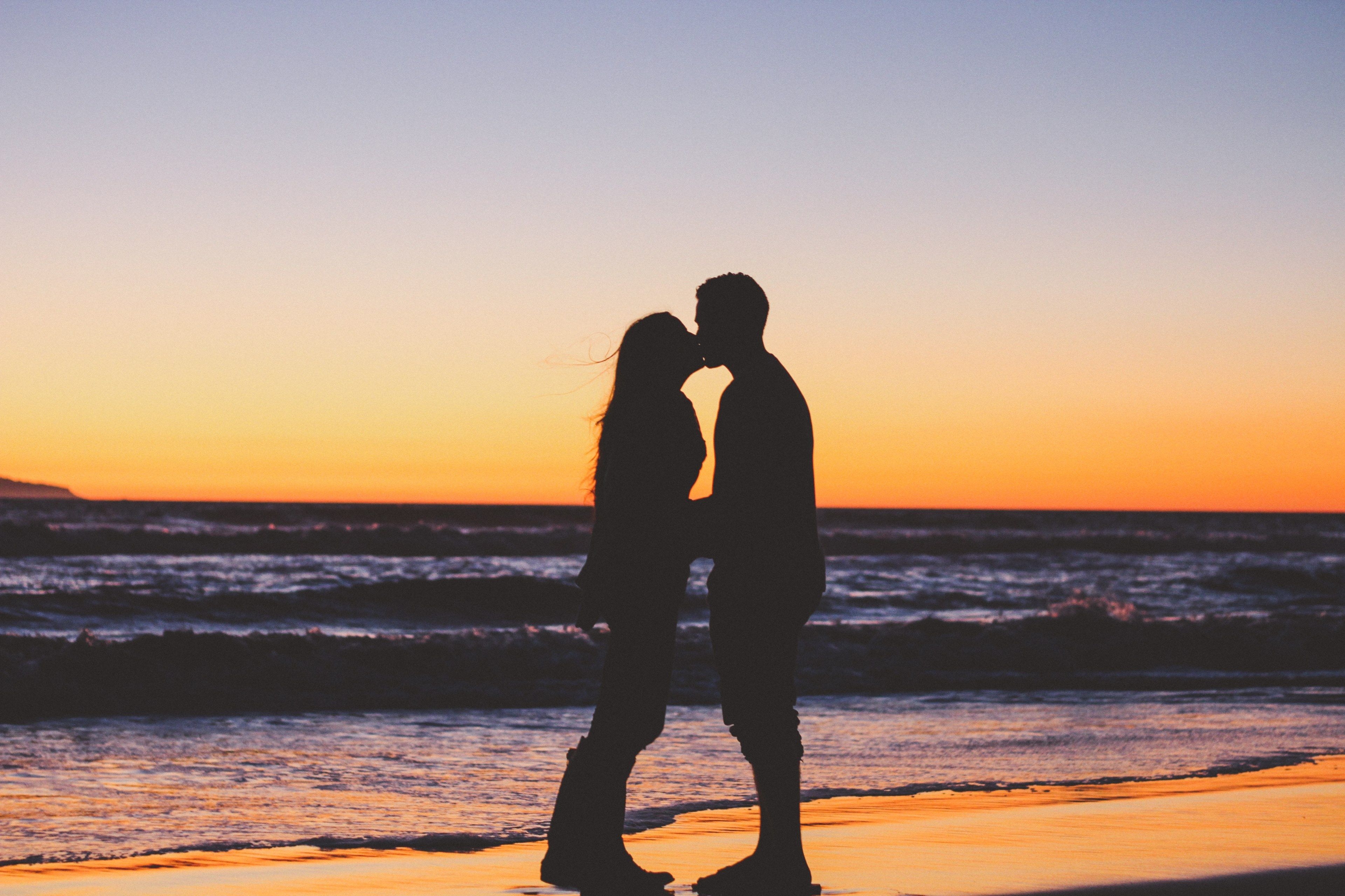 3840x2560 Wallpaper / girlfriend and boyfriend share a kiss at sunset on the beach in silhouette, happily ever after 4k wallpaper, Desktop