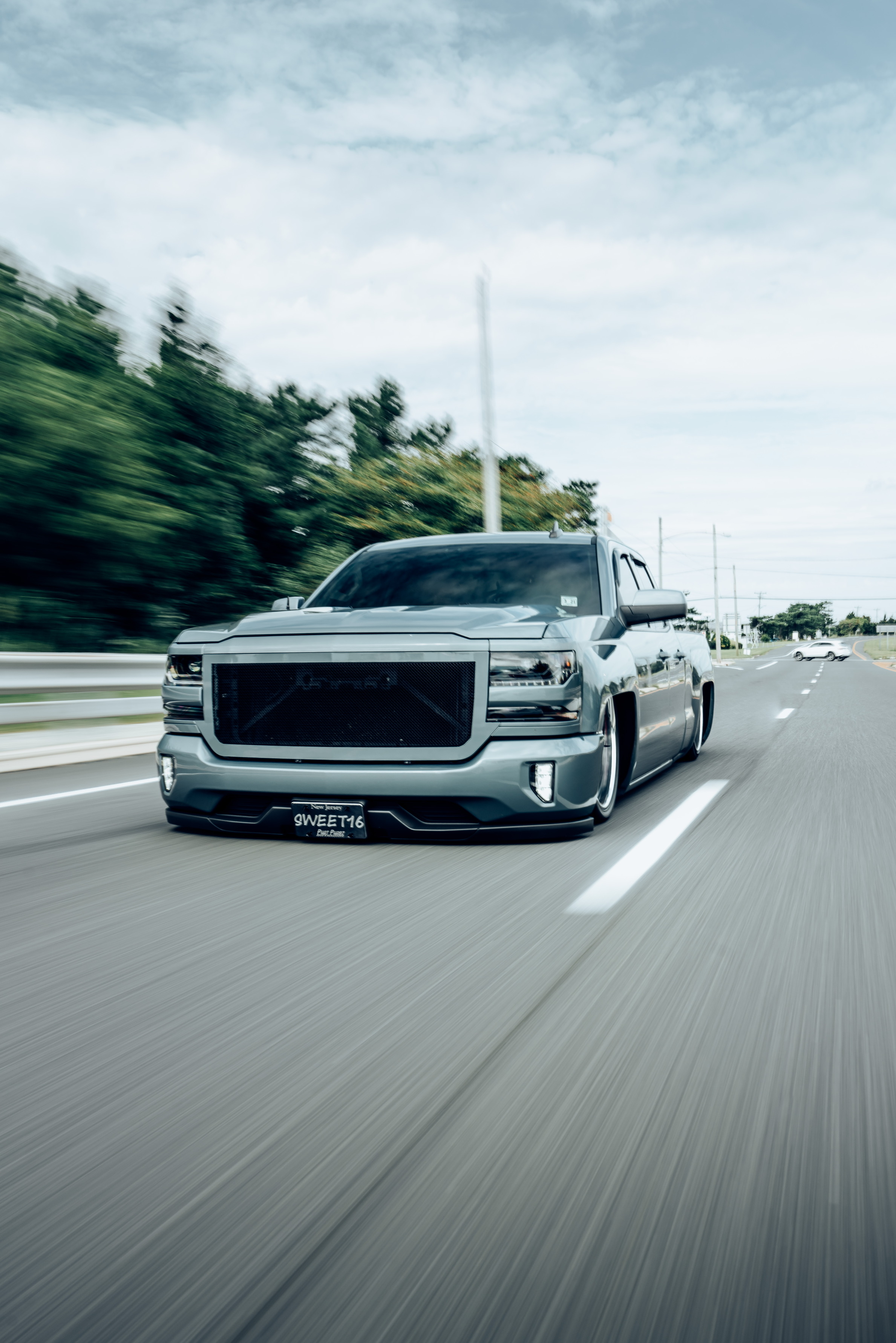 2380x3570 AccuAir Suspension sights in the rear view. #AccuAir equipped Silverado looks insane mobbing down the highway, Phone