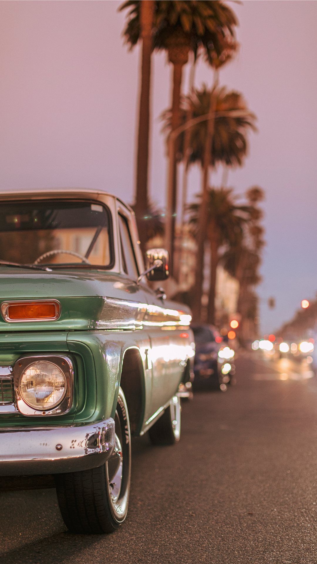 1080x1920 Vintage car parked on Ocean Blvd during sunset iPhone Wallpaper, Phone