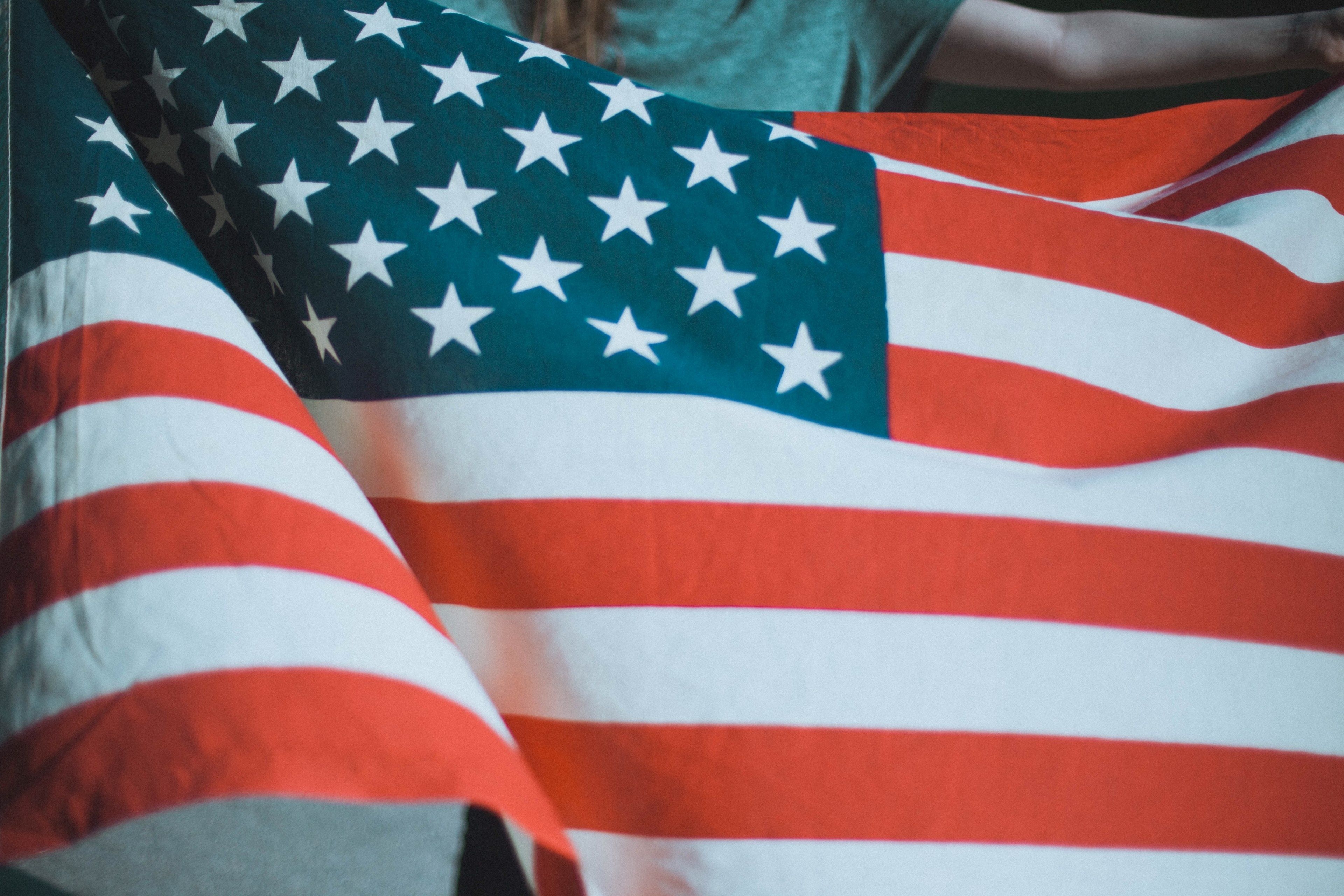 3840x2560 Wallpaper / a person holding an american flag, person holding american flag 4k wallpaper, Desktop