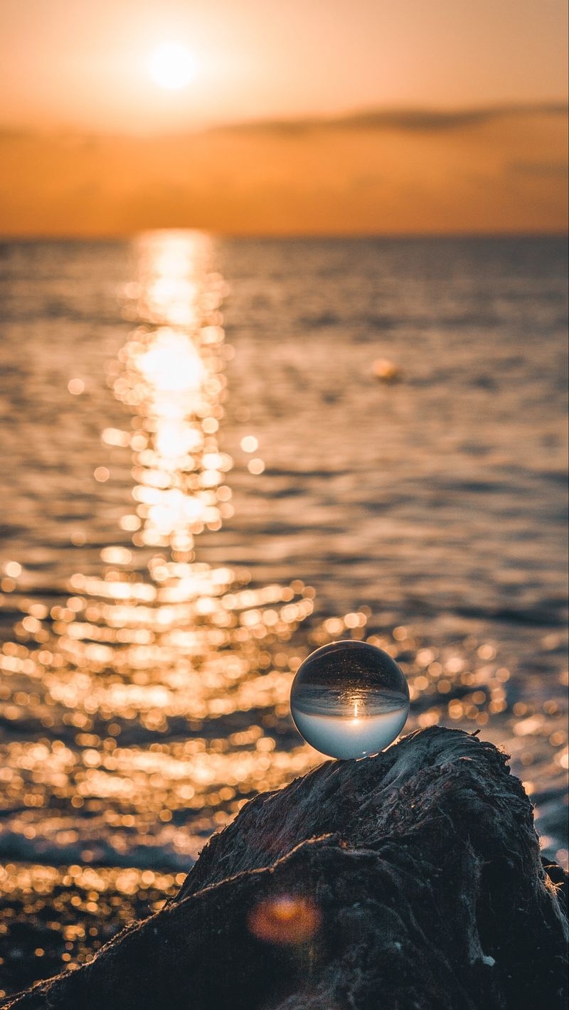 800x1420 Download Wallpaper  Ball, Glass, Glare, Sea, Sunset Iphone Se 5s 5c 5 For Parallax HD Background, Phone