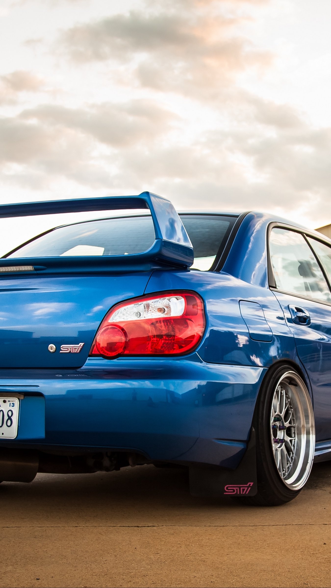 1350x2400 Download wallpaper  subaru, impreza, wrx, sti, blue, rear, Phone