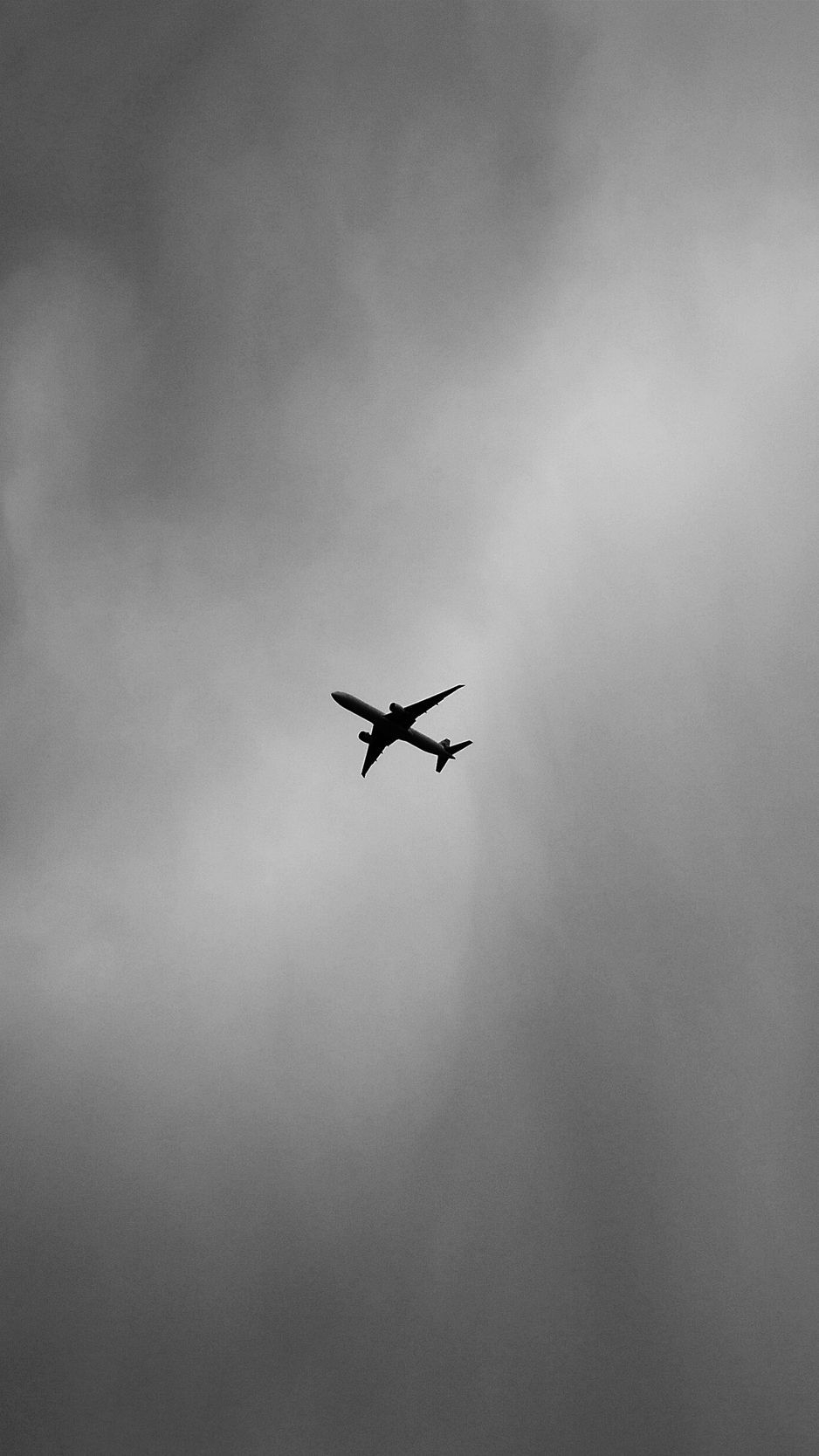 940x1670 Download wallpaper  airplane, bw, minimalism, flight, sky, Phone