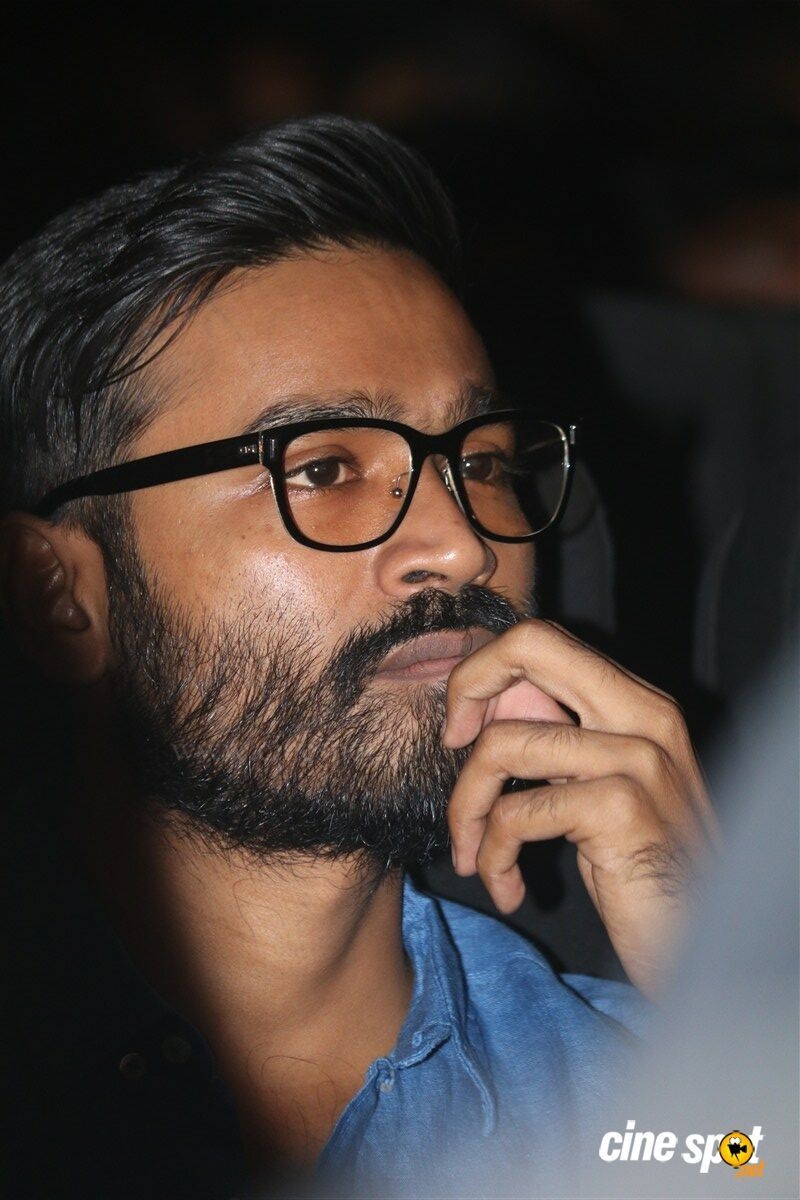 800x1200 Dhanush at Thodari Audio Launch (3), Phone