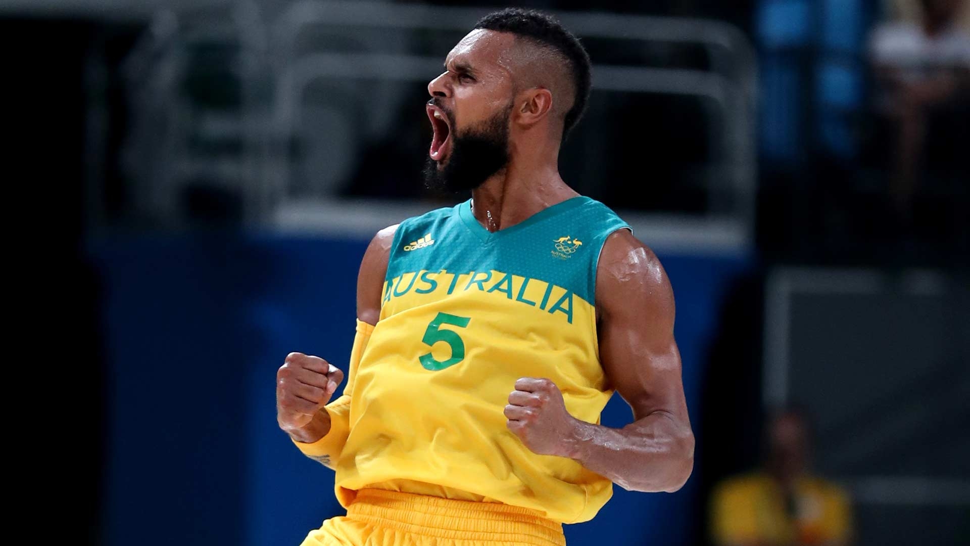 1920x1080 Australia routs Lithuania to advance to men's basketball, Desktop