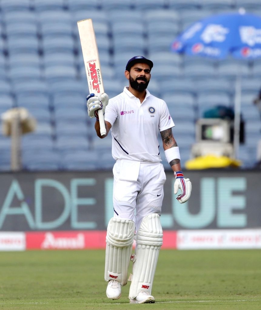 870x1030 Pune: Indian skipper Virat Kohli celebrates his double century on Day 2 of the second Test matc. Virat kohli wallpaper, Virat kohli instagram, India cricket team, Phone